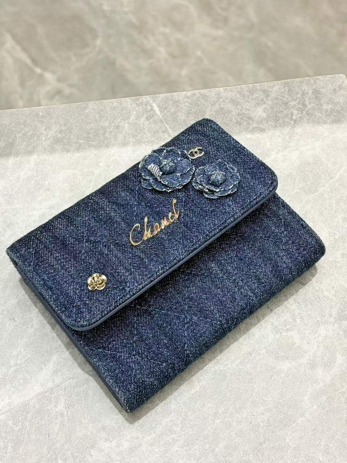 CHANEL Denim Wallet – Blue Quilted Denim with Camellia Appliqué and Gold-Tone CC, 27 Series, Good Pre-Owned
