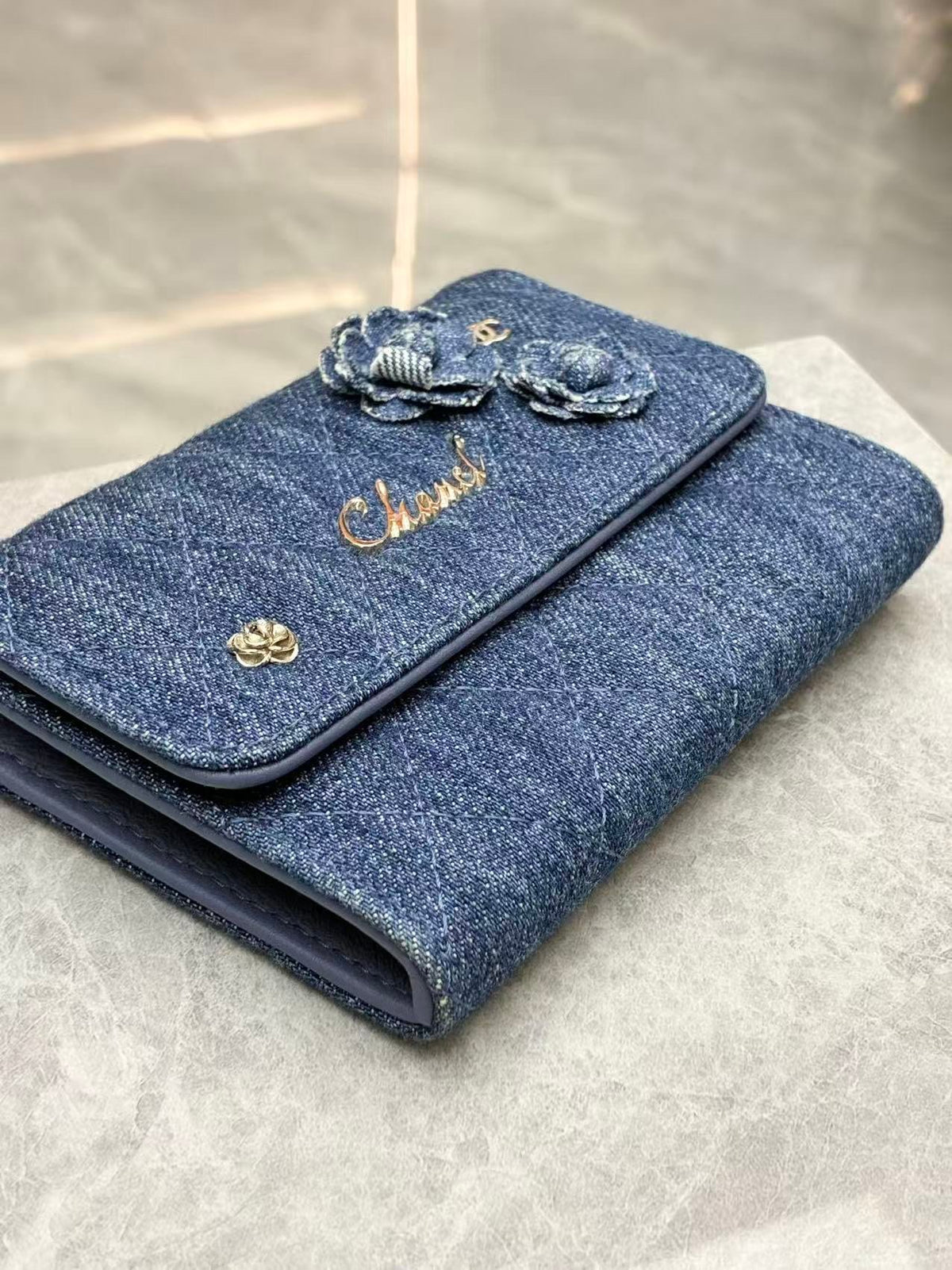 CHANEL Denim Wallet – Blue Quilted Denim with Camellia Appliqué and Gold-Tone CC, 27 Series, Good Pre-Owned