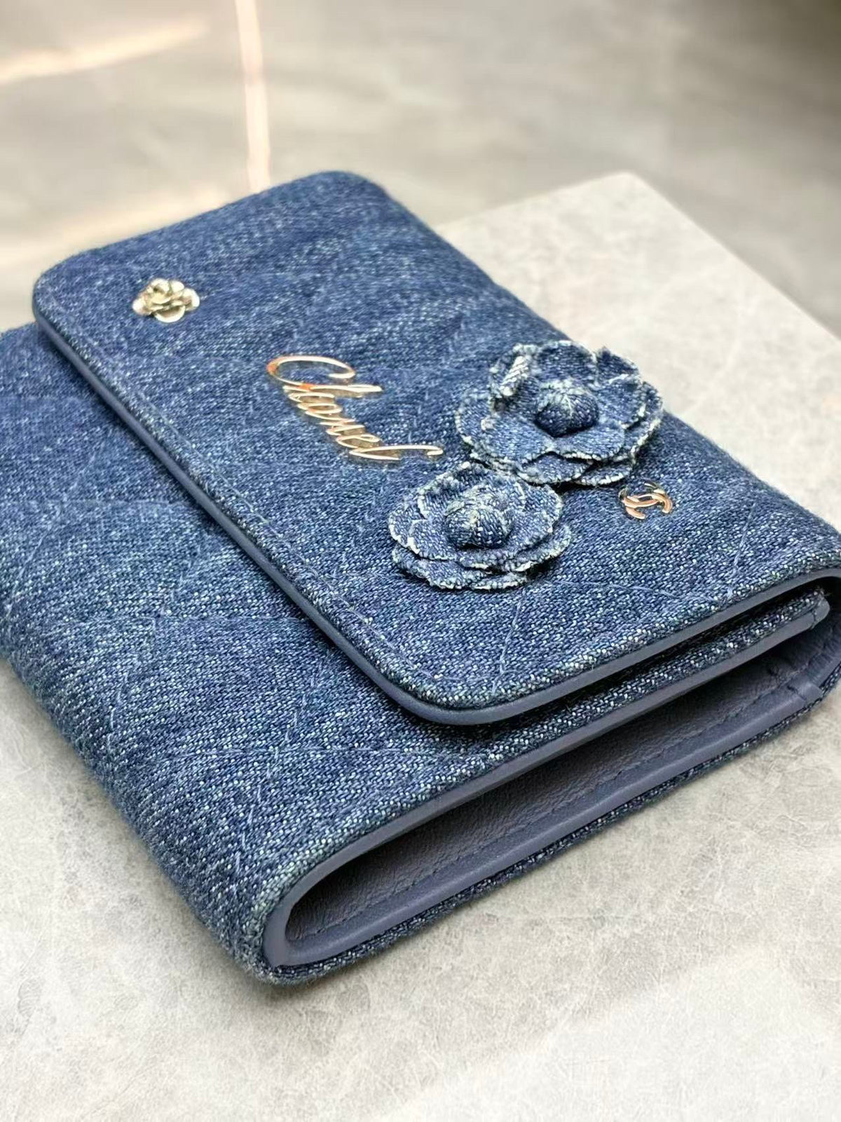 CHANEL Denim Wallet – Blue Quilted Denim with Camellia Appliqué and Gold-Tone CC, 27 Series, Good Pre-Owned