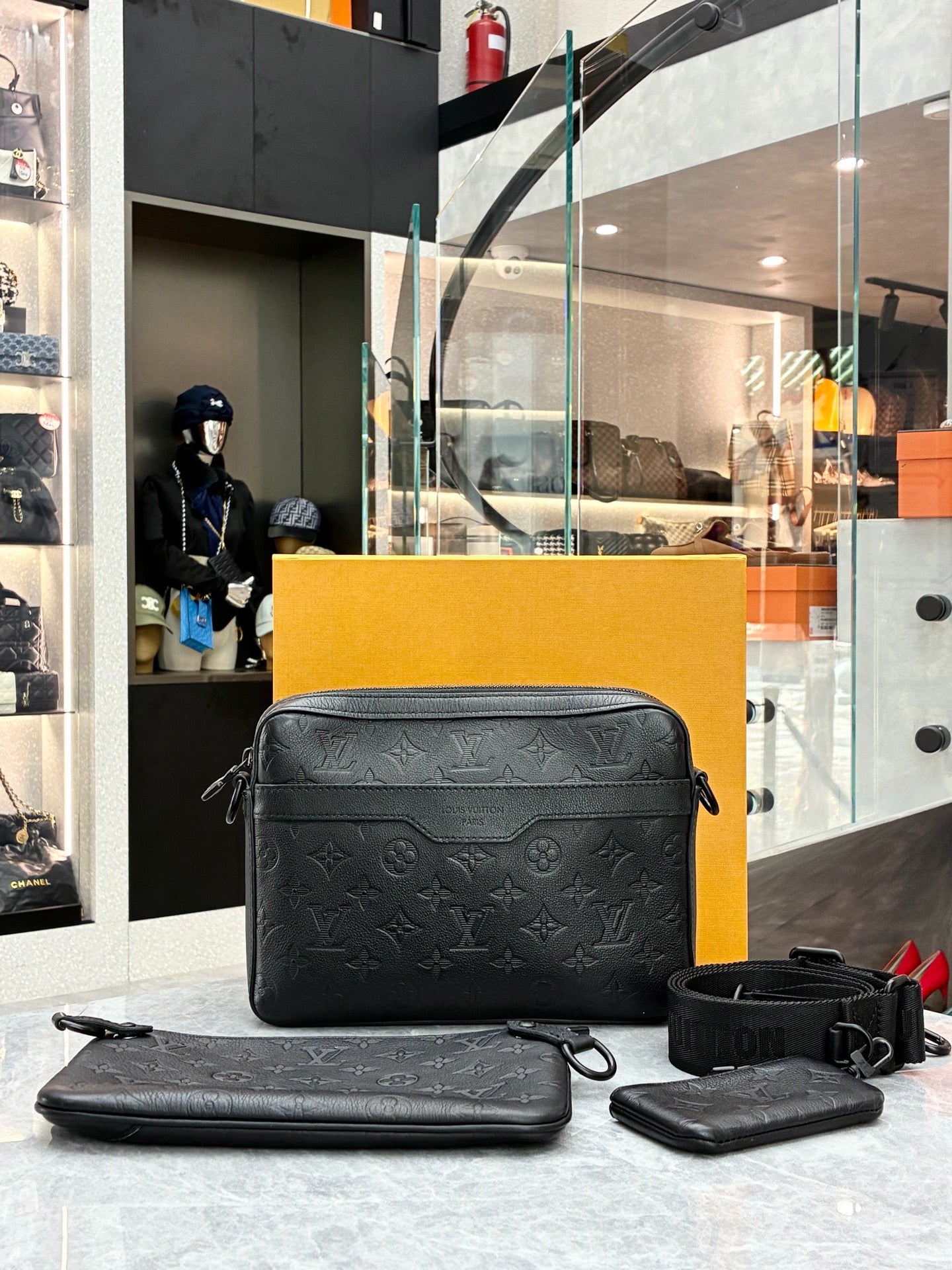 Louis Vuitton Trio Messenger bag in black Monogram Shadow calf leather
