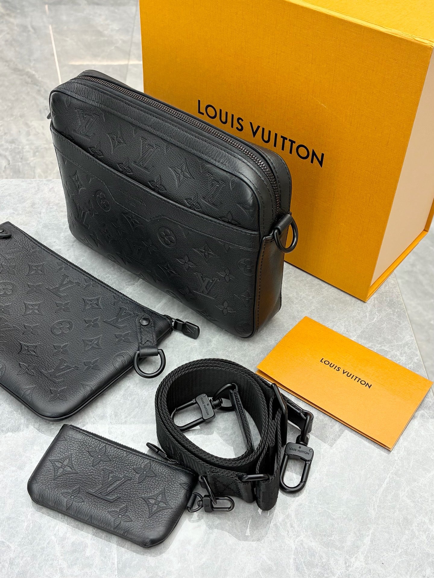 Louis Vuitton Trio Messenger bag in black Monogram Shadow calf leather