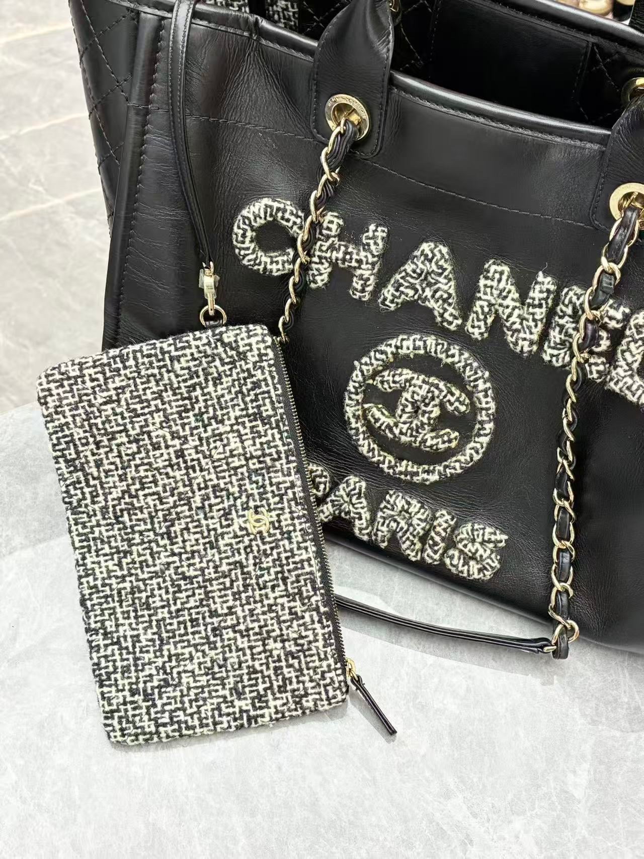 Chanel Deauville studded tote bag crafted from black caviar leather