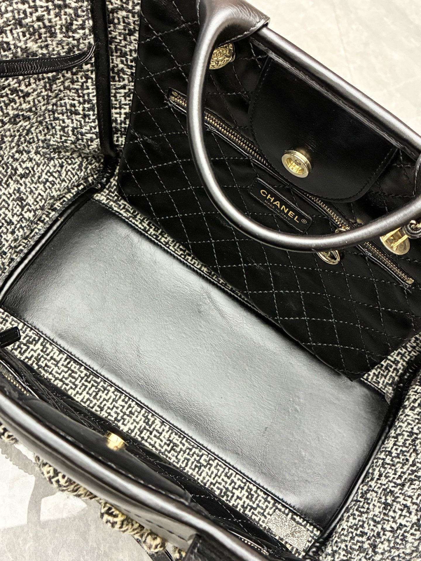 Chanel Deauville studded tote bag crafted from black caviar leather