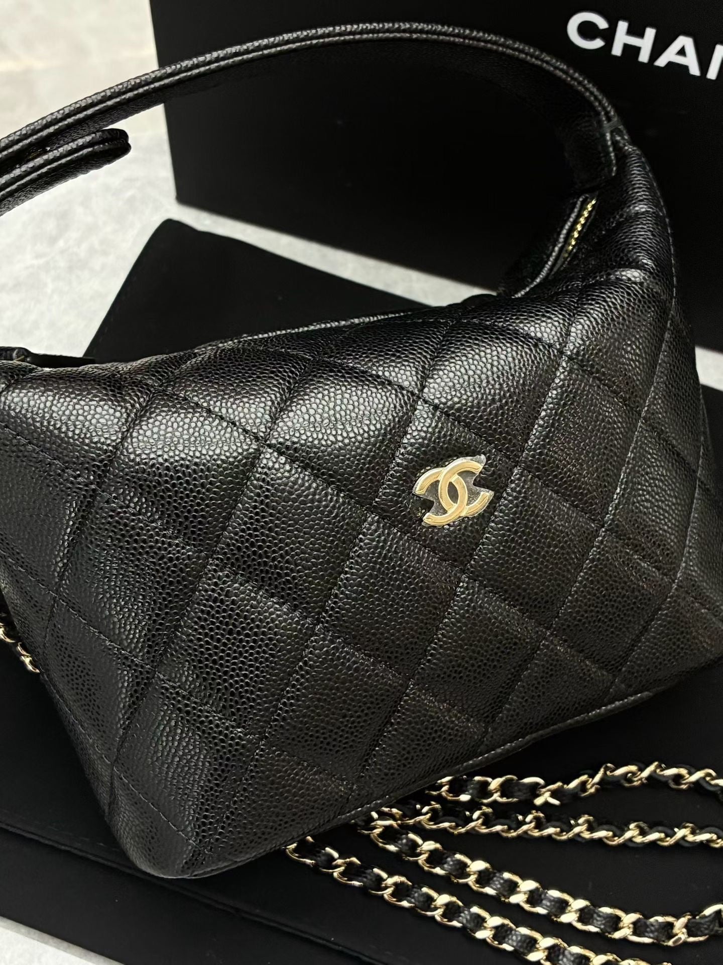 Chanel quilted caviar leather hobo clutch with chain