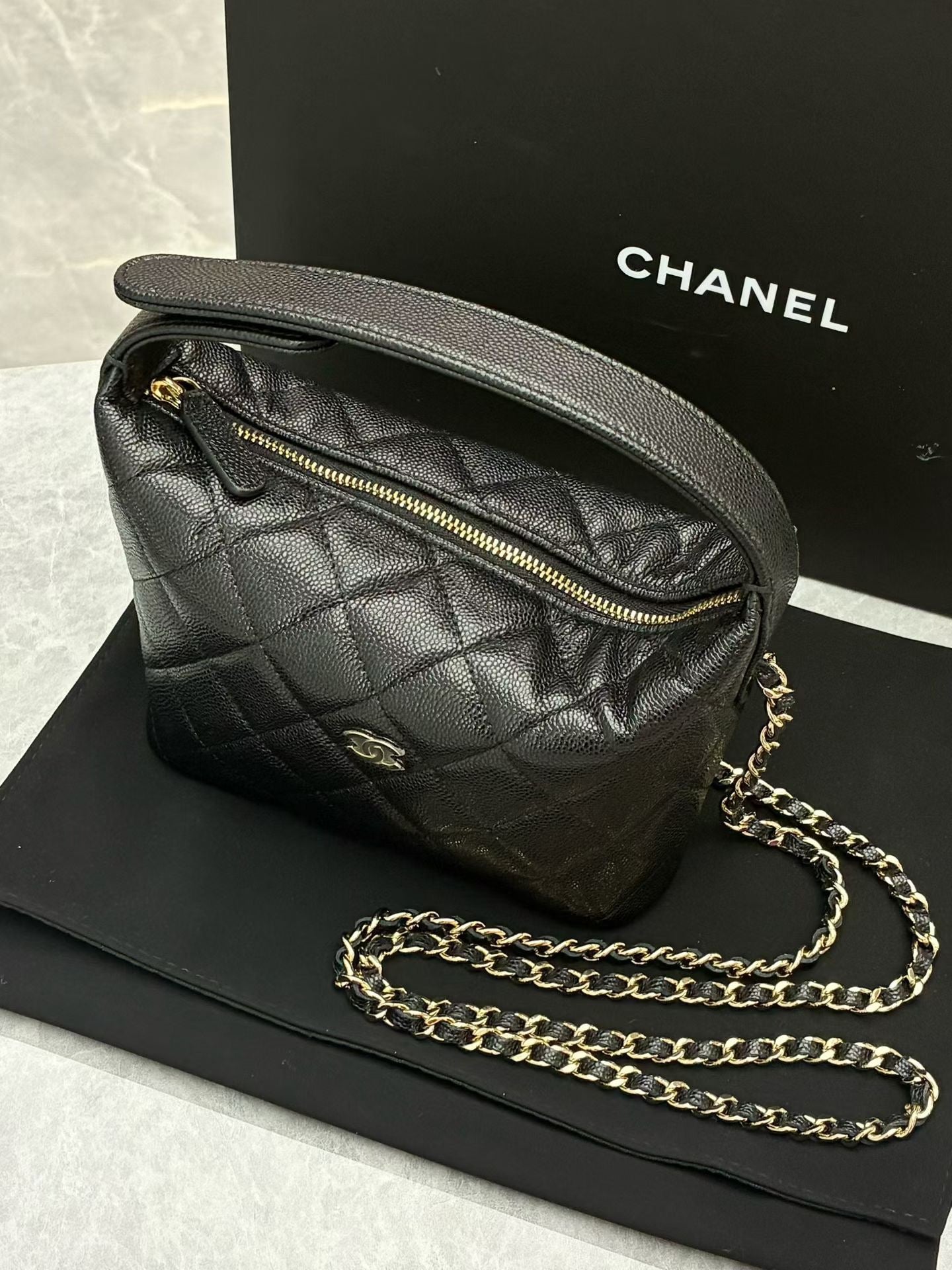 Chanel quilted caviar leather hobo clutch with chain