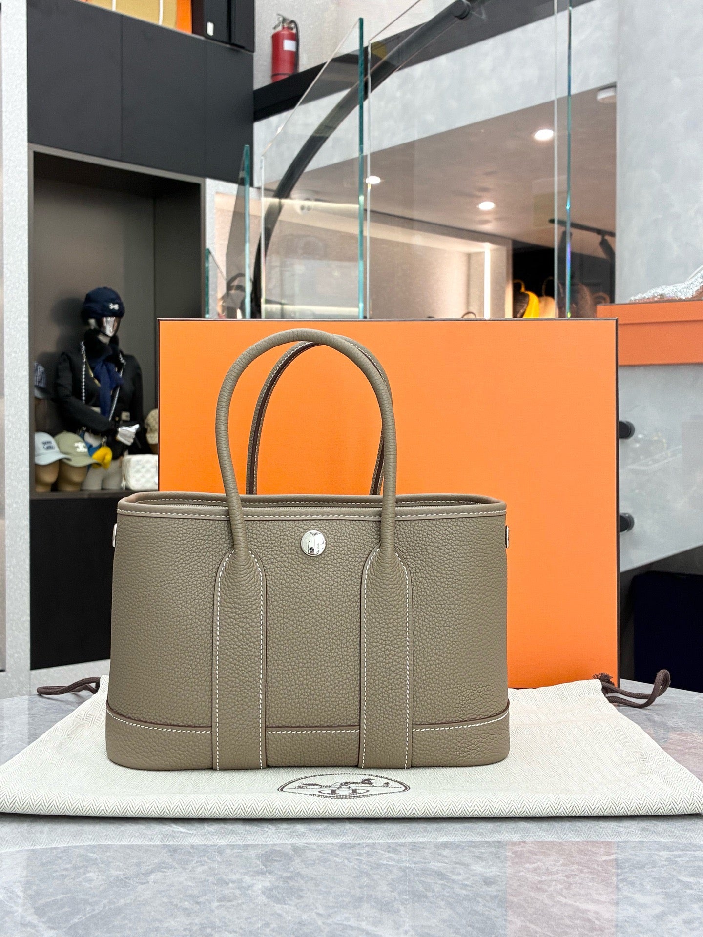 Hermès Neo Garden Party 23 bag in Etoupe Togo leather with silver-tone hardware (G stamp)