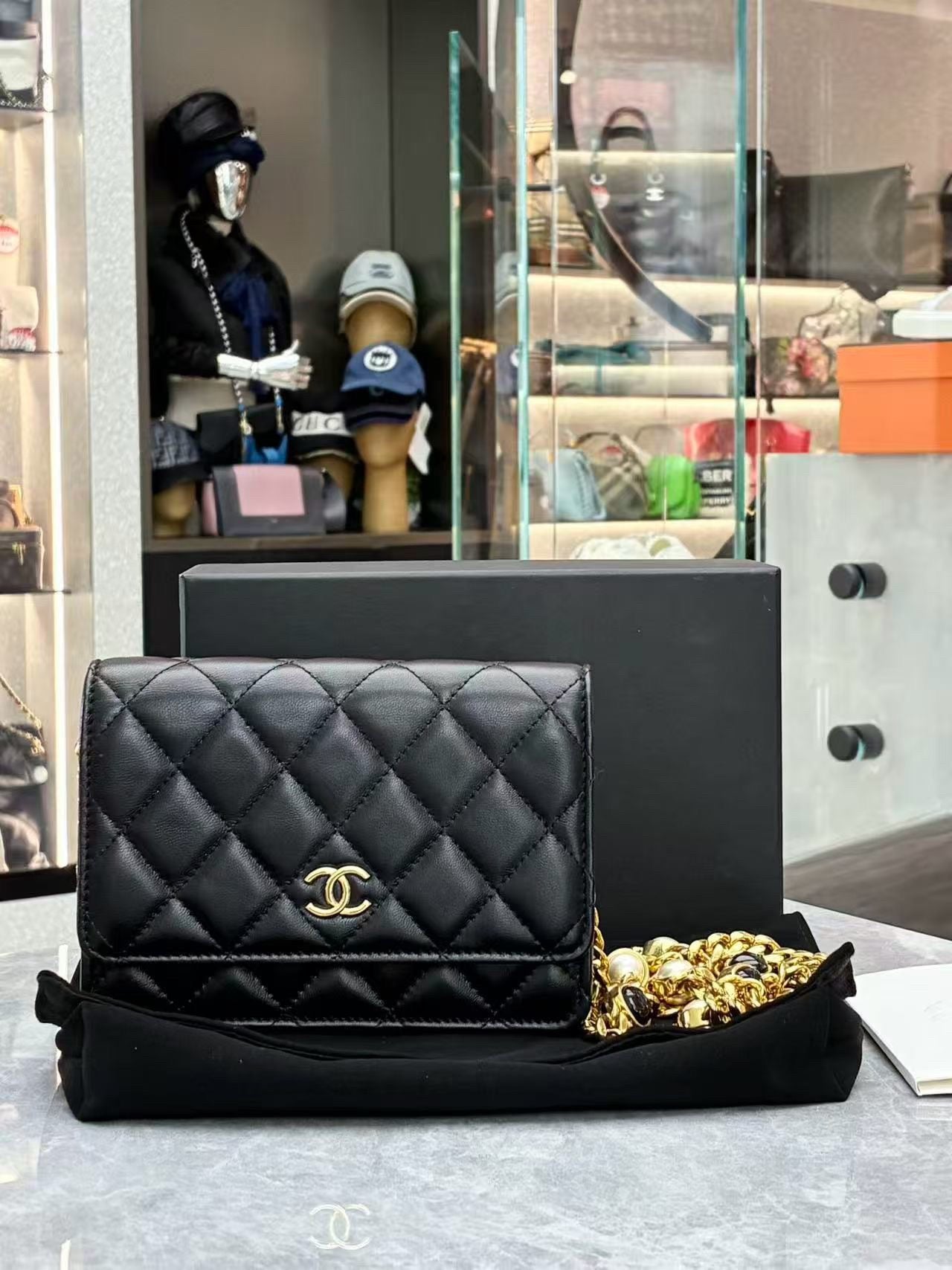 Chanel Pearl Crush Wallet on Chain in black quilted lambskin leather