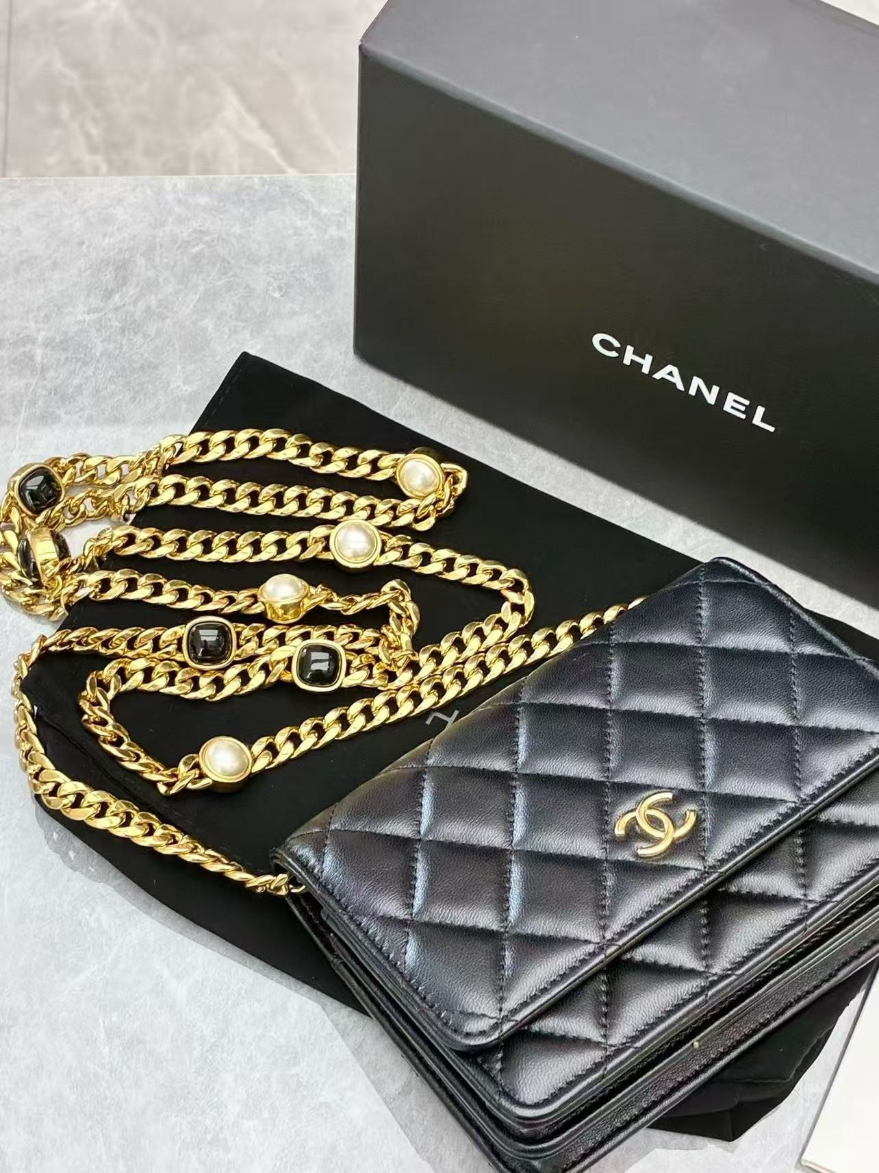Chanel Pearl Crush Wallet on Chain in black quilted lambskin leather