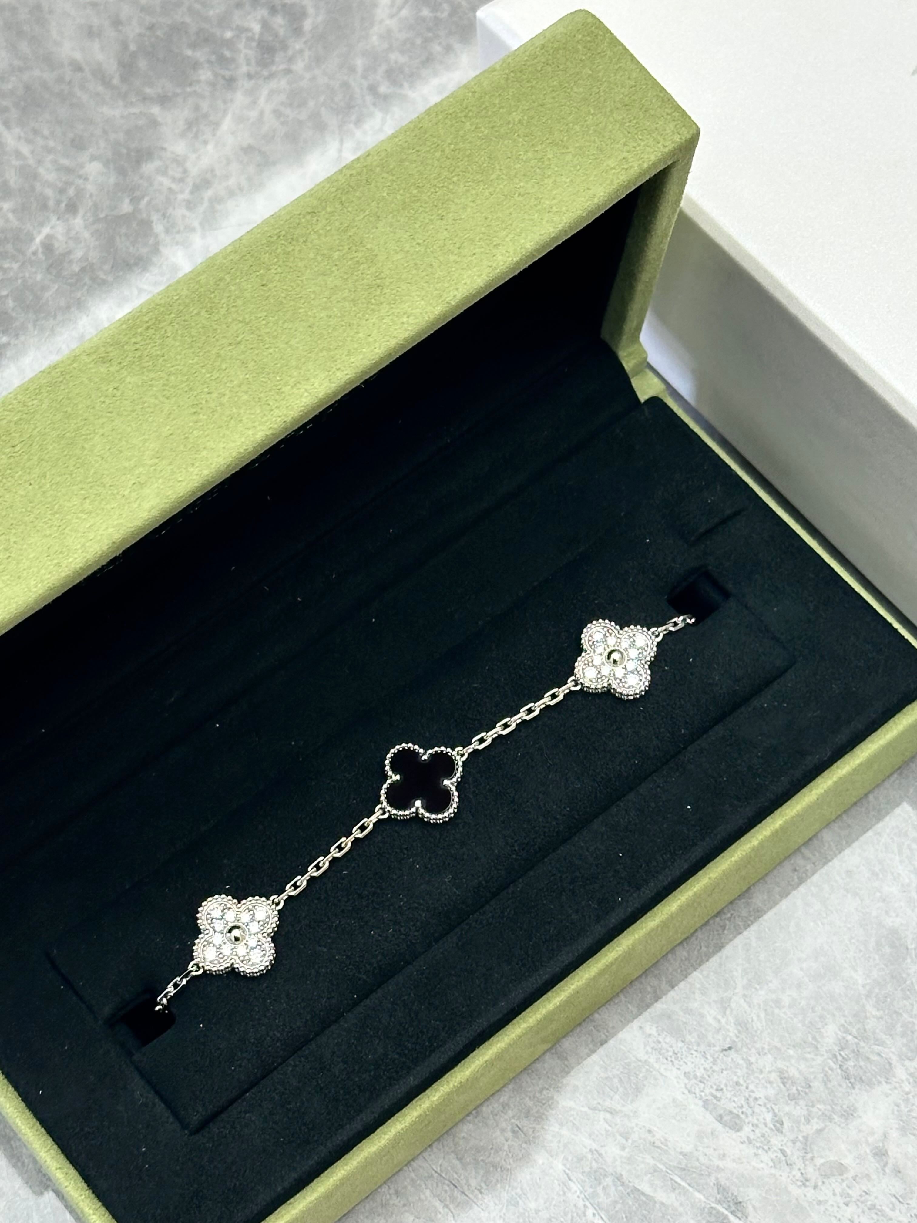 Van Cleef & Arpels Vintage Alhambra 5-motif bracelet in 18K white gold, featuring alternating diamond and onyx motifs