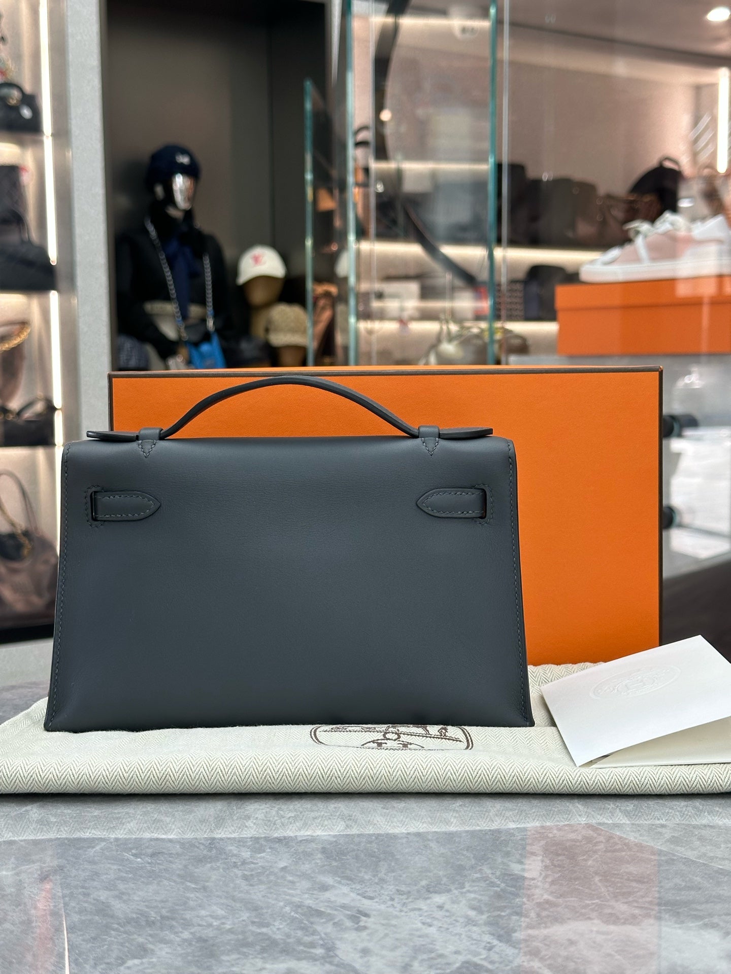 HERMÈS Mini Kelly I – Haze Grey Leather, Palladium Hardware, W Stamp, Excellent Pre-Owned