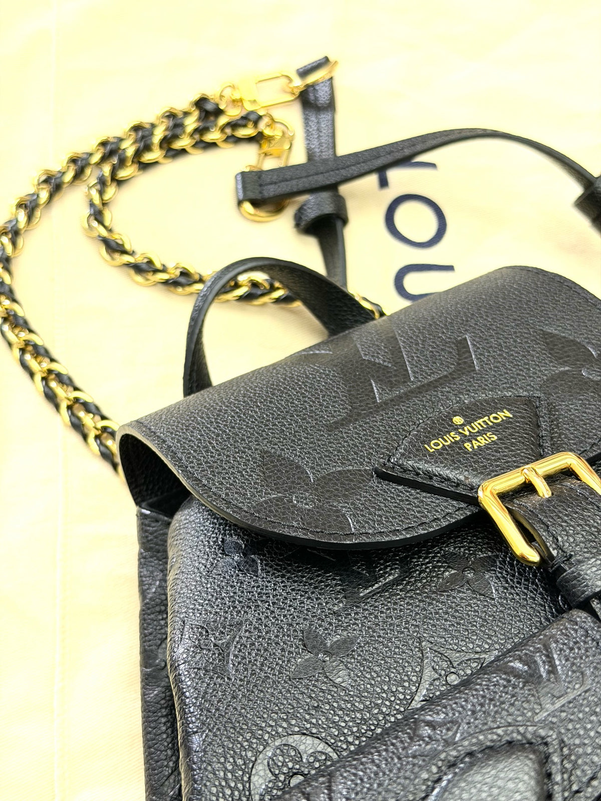 LOUIS VUITTON Monogram Canvas Backpack with Buckle Pockets – Black Grained Leather and Gold-Tone Hardware, 99% New