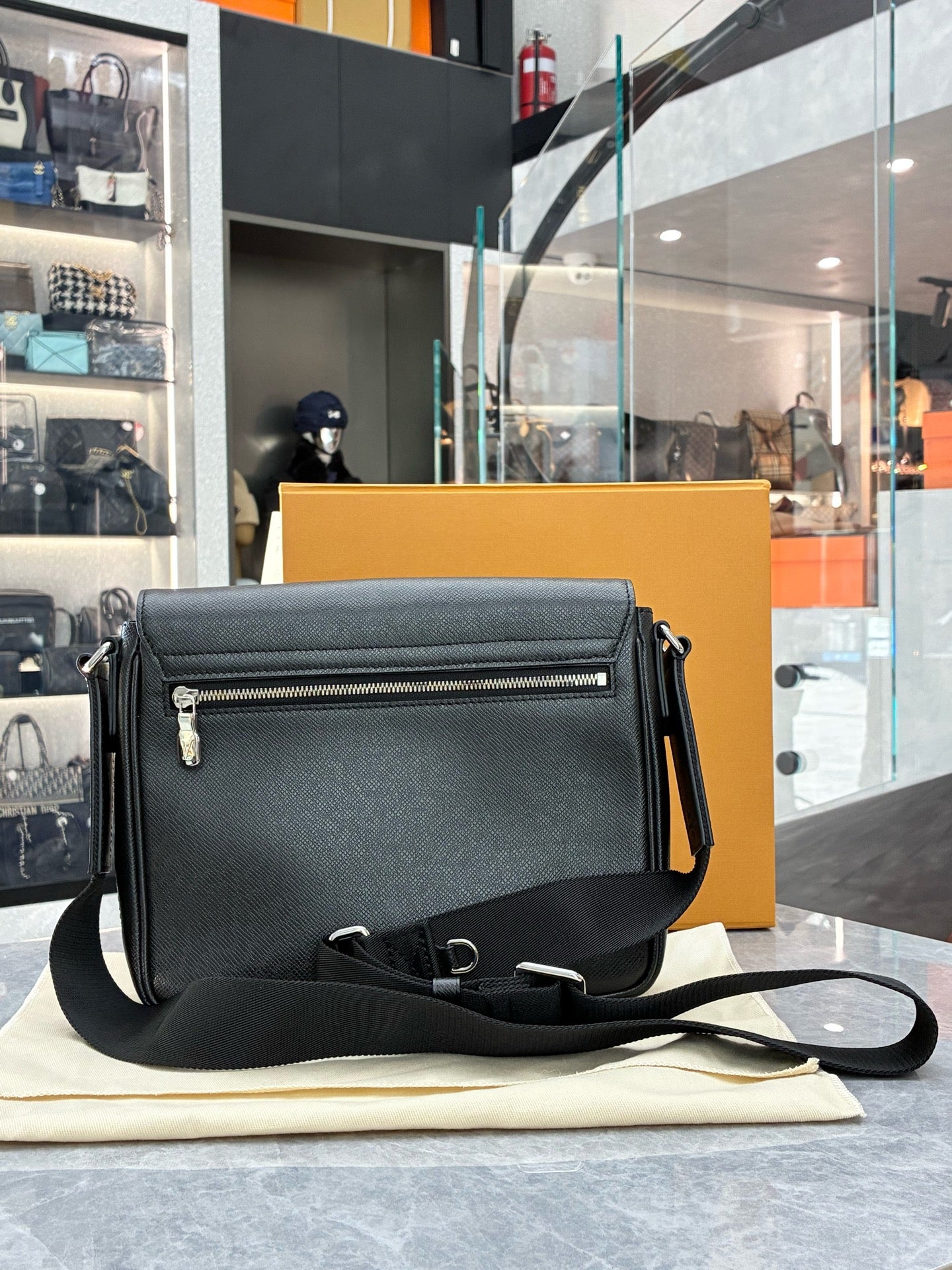 LOUIS VUITTON District PM Messenger Bag – Black Taïga Leather, Silver Hardware, Pre-Owned
