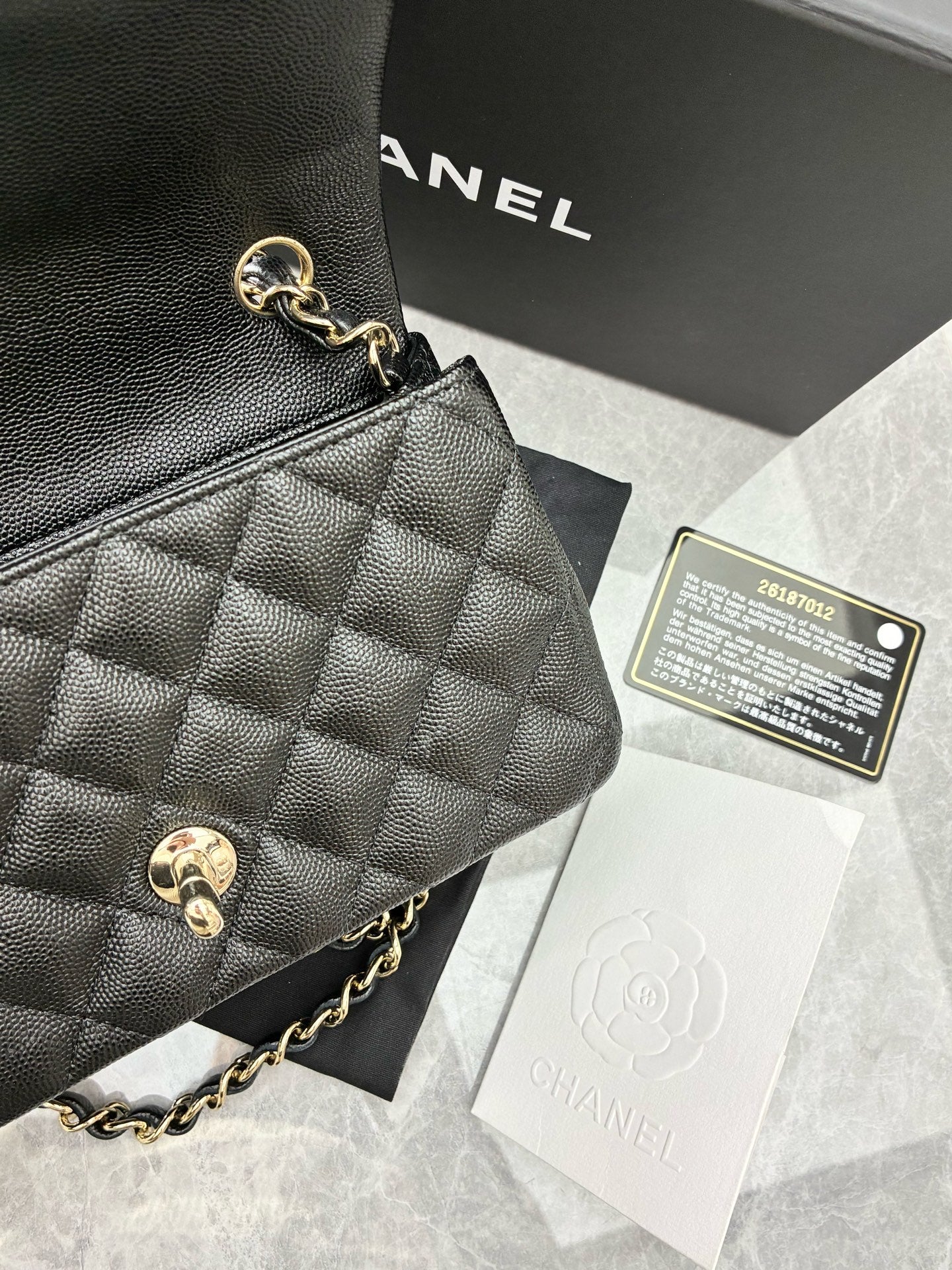 CHANEL Rectangular Mini Flap Bag – Black Caviar Leather, Champagne Gold Hardware, Pre-Owned