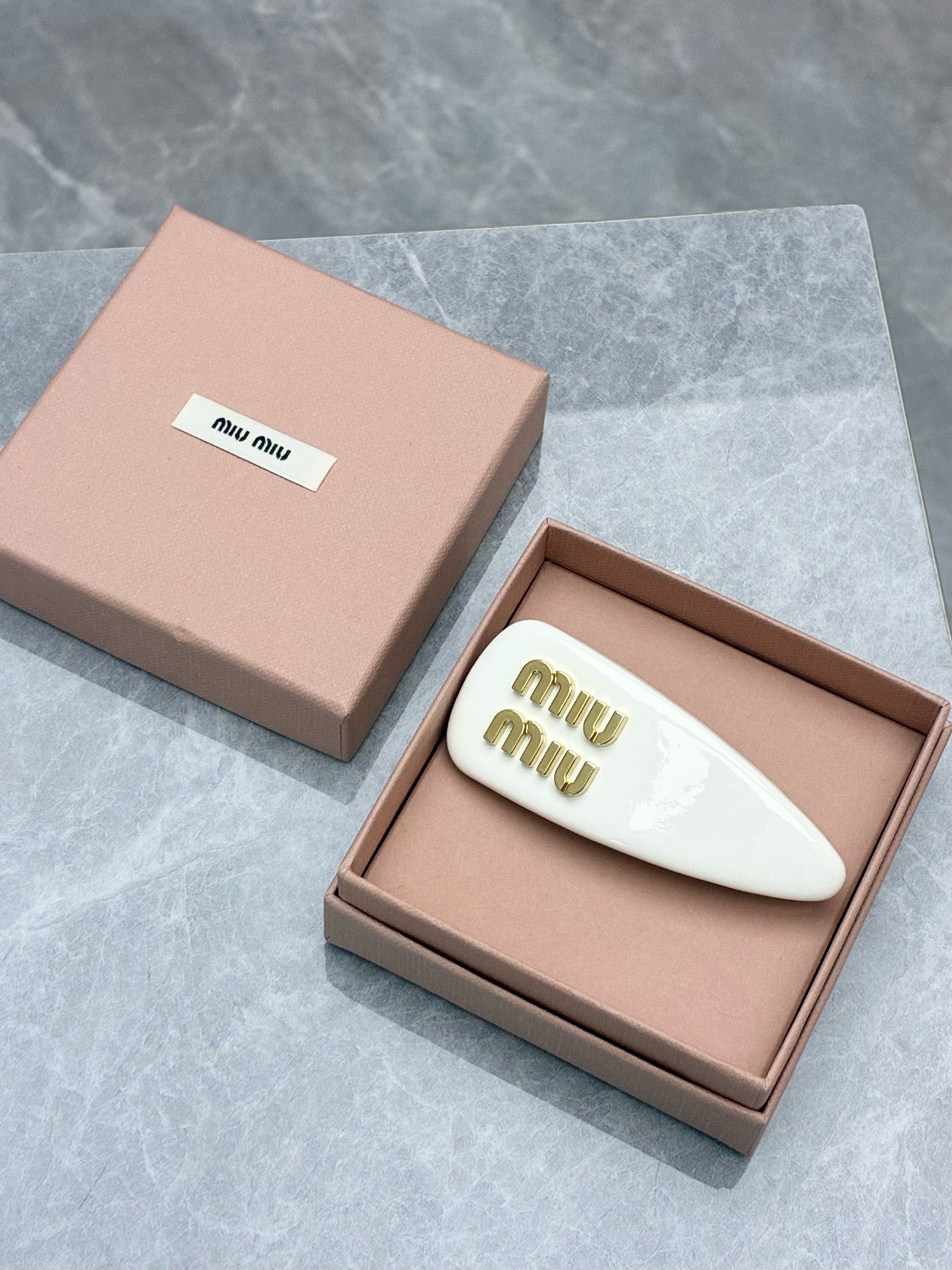 Miu Miu Patent Leather Hair Clip – White with Gold Logo, Pre-Owned