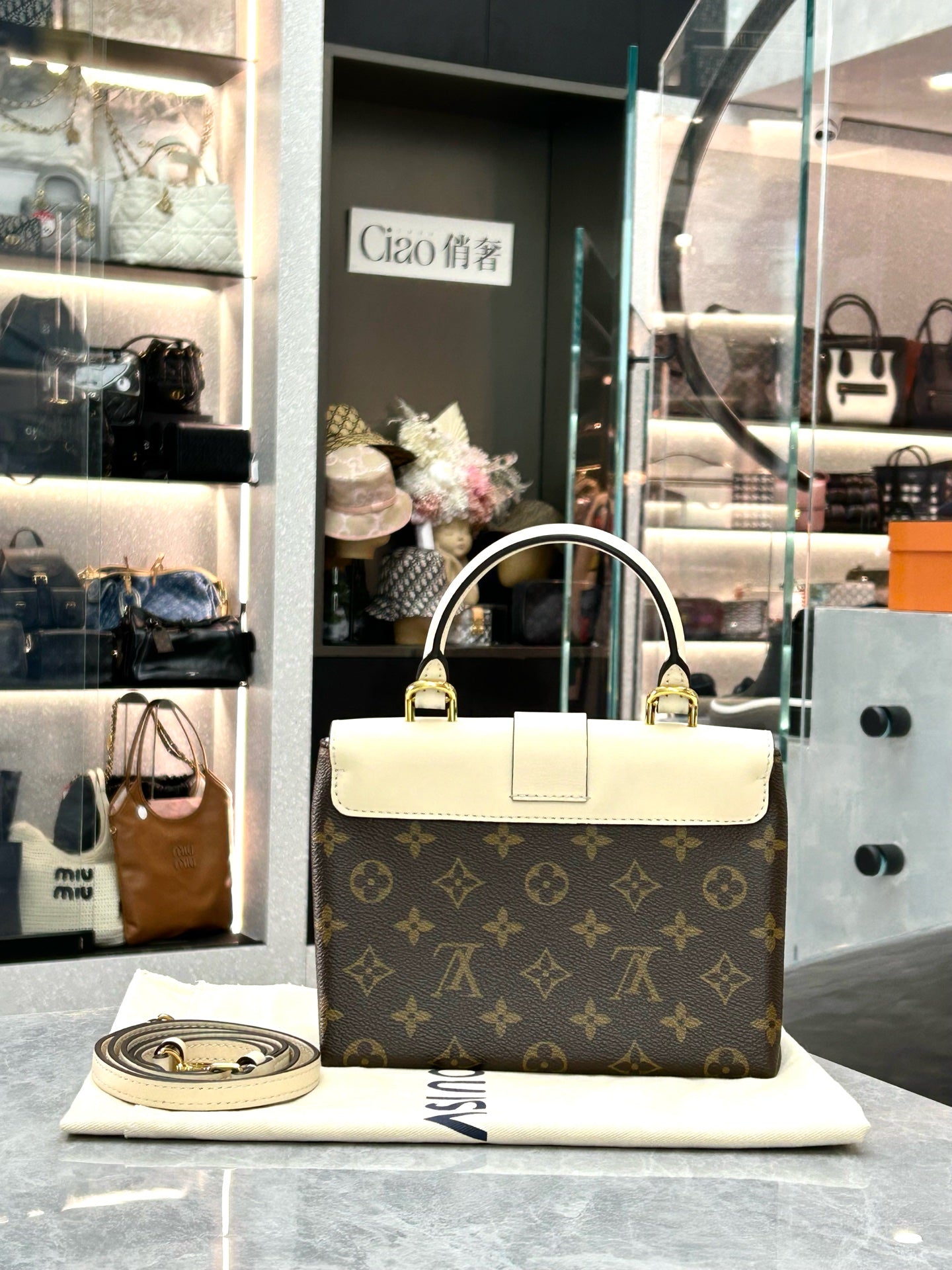 LOUIS VUITTON Locky BB – Monogram Canvas & Cream Leather, Gold Padlock, Very Good Pre-Owned