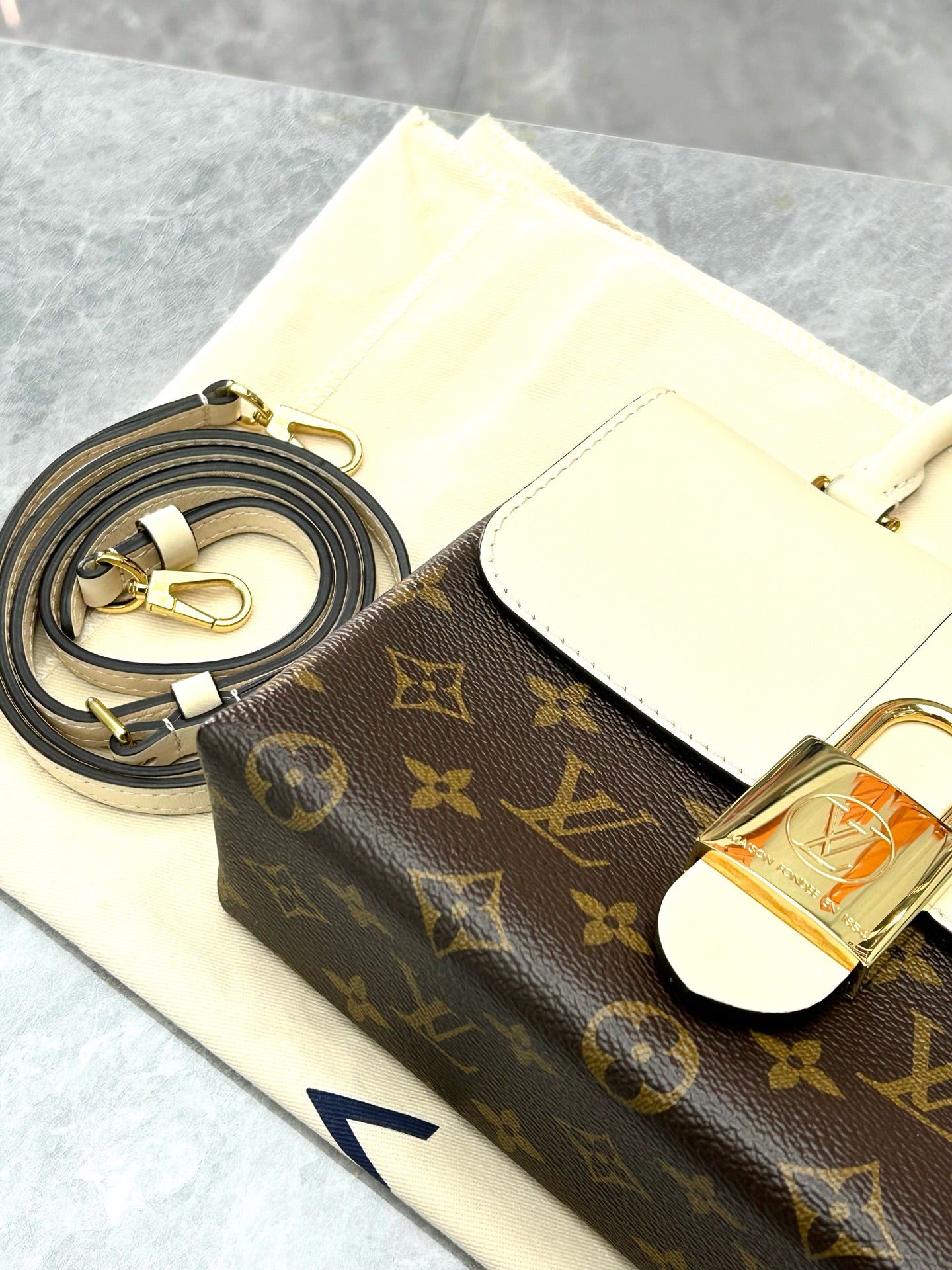 LOUIS VUITTON Locky BB – Monogram Canvas & Cream Leather, Gold Padlock, Very Good Pre-Owned