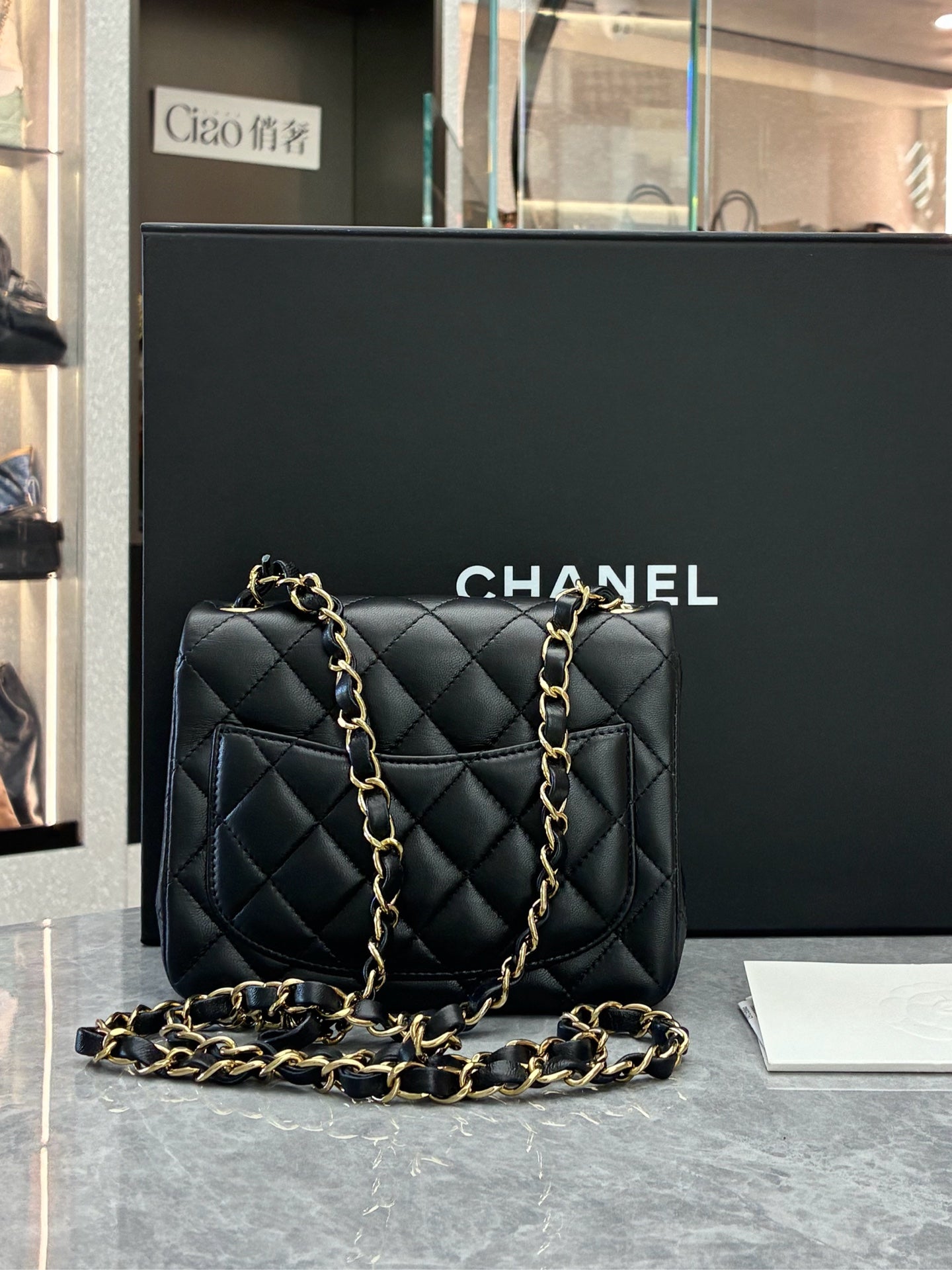 CHANEL Classic Flap Mini Square – Black Lambskin, Champagne Gold Hardware, Reference A69900, Excellent Pre-Owned