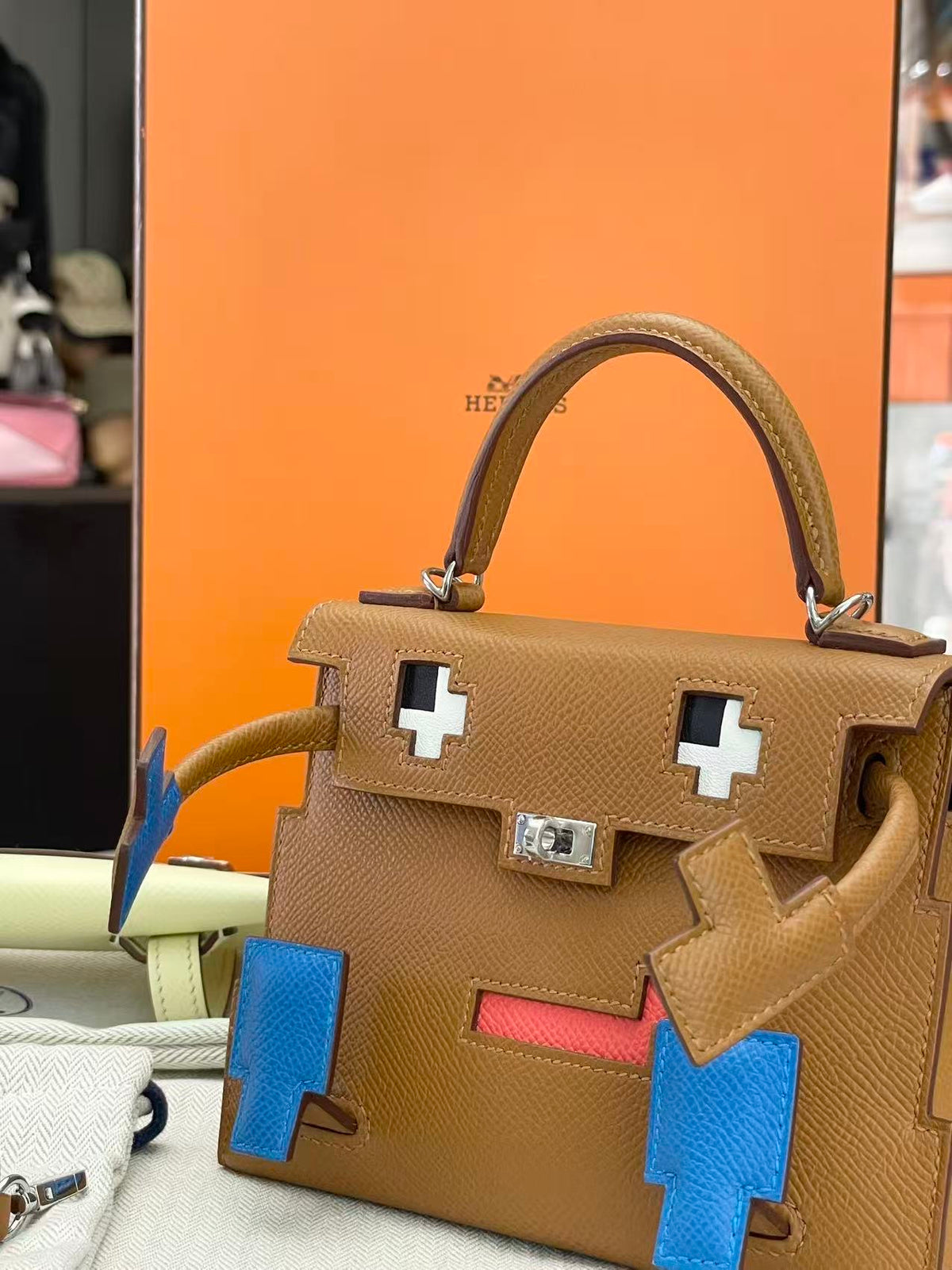 HERMÈS Kelly Doll – Gold Epsom with Bleu France Pixel Mosaic, Palladium Hardware, K Stamp, Brand New