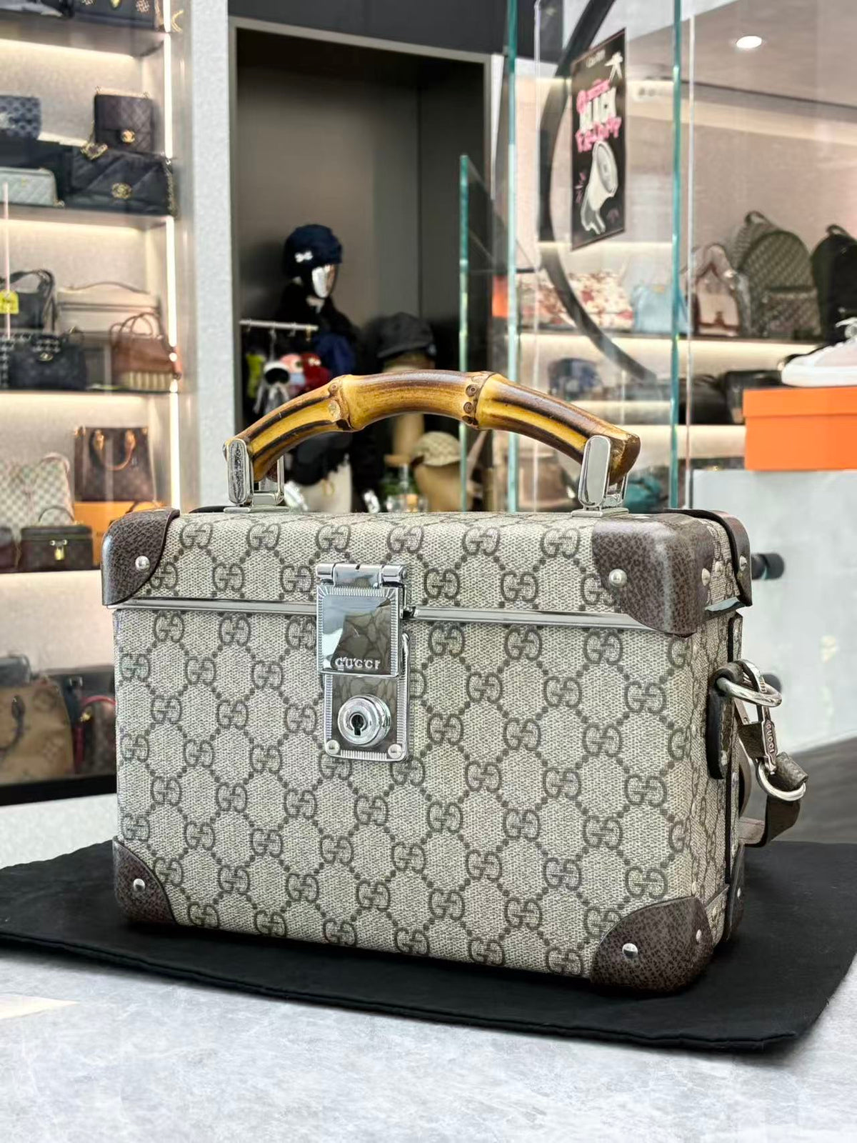GUCCI Monogram Hard-Sided Trunk Case – GG Supreme Canvas, Bamboo Top Handle, Silver Hardware, Good Pre-Owned