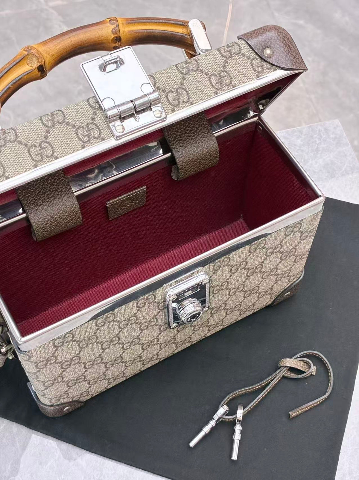 GUCCI Monogram Hard-Sided Trunk Case – GG Supreme Canvas, Bamboo Top Handle, Silver Hardware, Good Pre-Owned