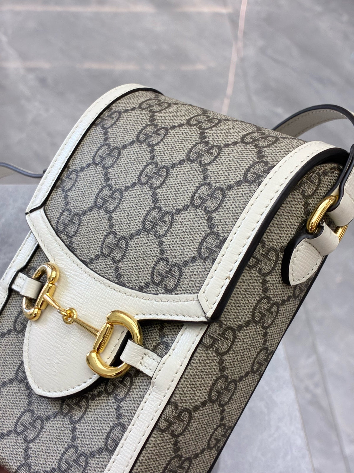 GUCCI Horsebit 1955 Mini Bag – Beige GG Supreme Canvas with White Leather Trim, Gold Hardware, Good Pre-Owned