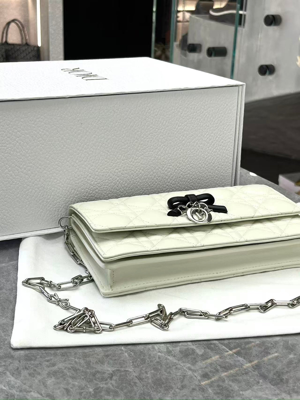CHRISTIAN DIOR Lady Dior East-West – Ivory Cannage Lambskin with Black Bow, Silver Hardware, Excellent Pre-Owned