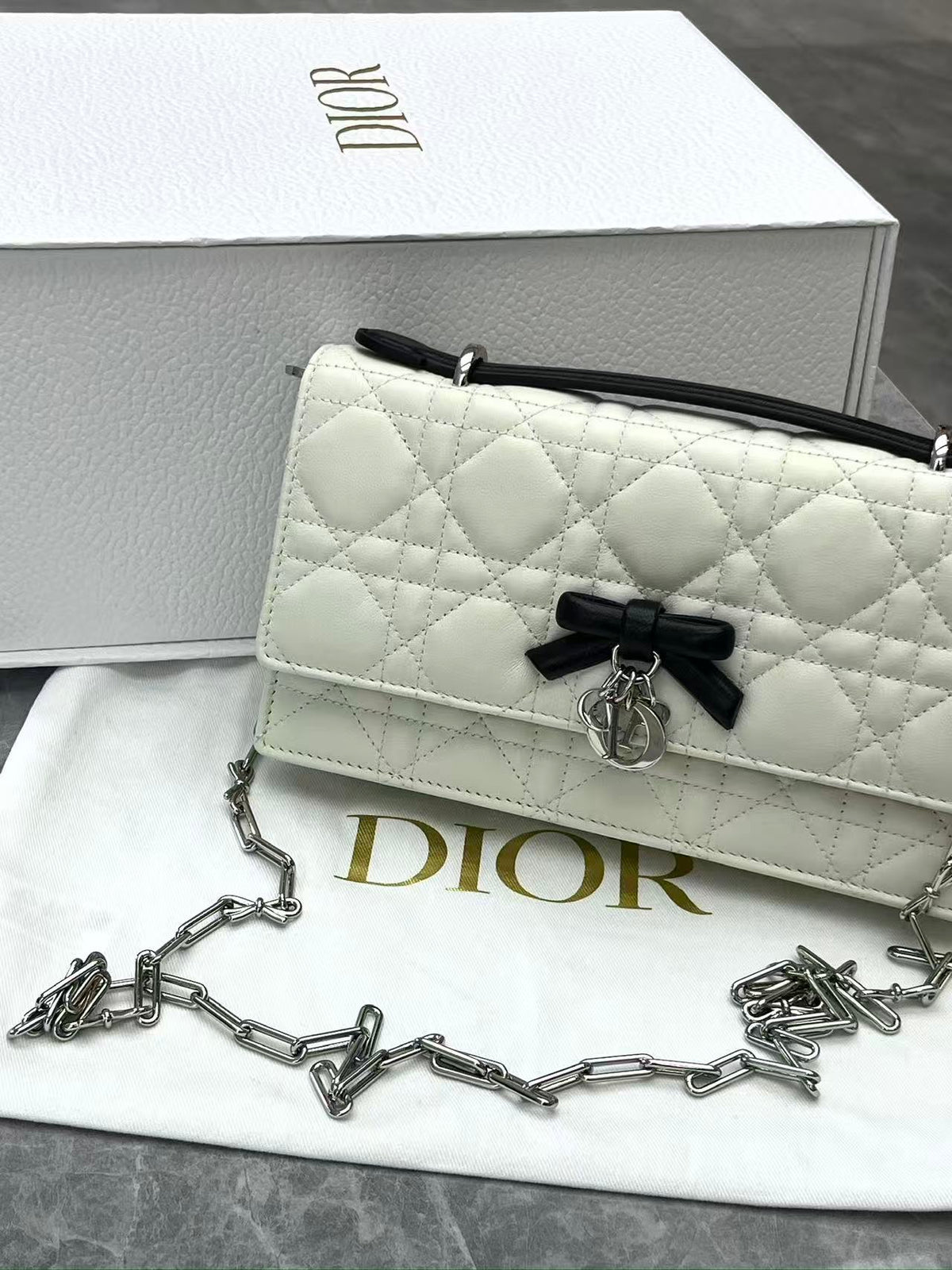 CHRISTIAN DIOR Lady Dior East-West – Ivory Cannage Lambskin with Black Bow, Silver Hardware, Excellent Pre-Owned
