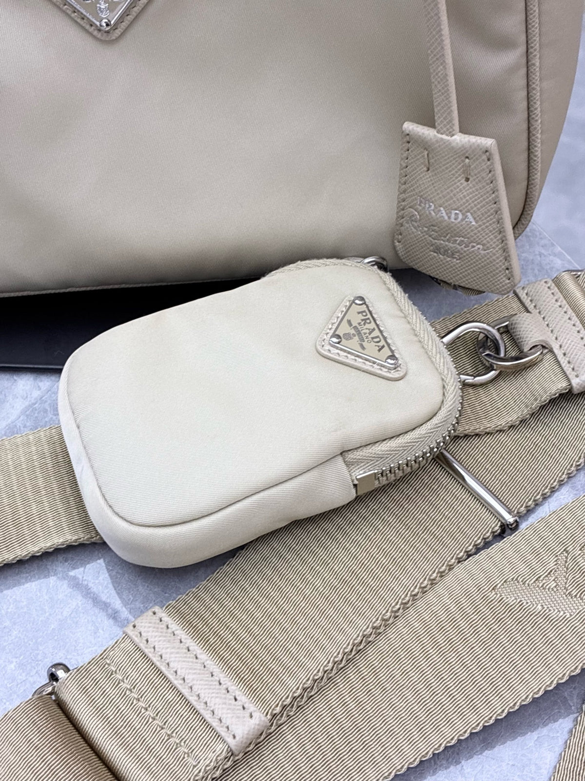 PRADA Re-Nylon Hobo Bag – Milk Tea Nylon with Silver Chain and Woven Strap, Convertible, Good Pre-Owned