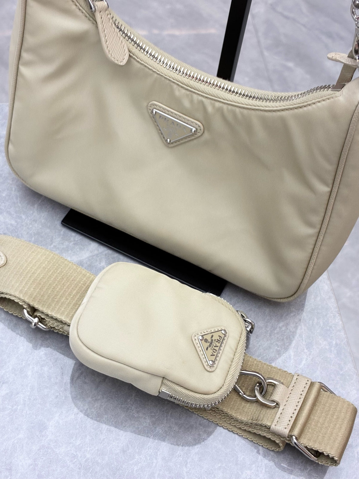 PRADA Re-Nylon Hobo Bag – Milk Tea Nylon with Silver Chain and Woven Strap, Convertible, Good Pre-Owned