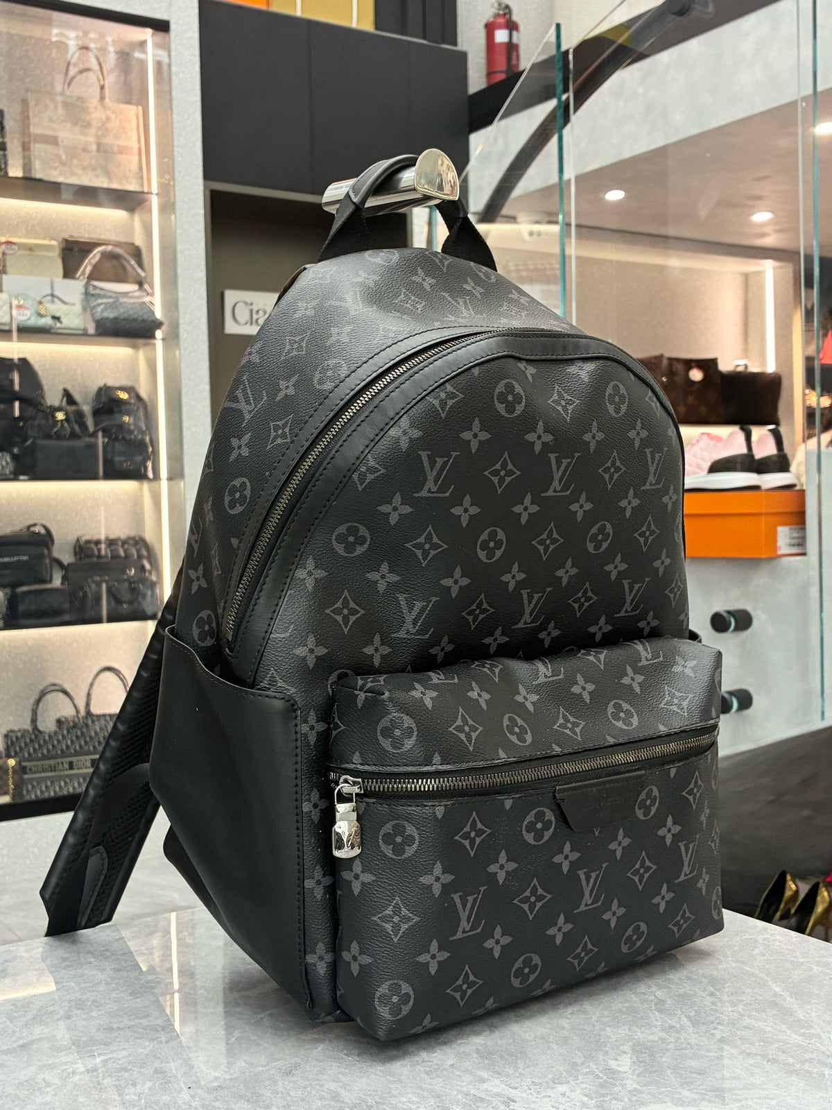 LOUIS VUITTON Discovery Microchip Backpack – Black Monogram Coated Canvas with Black Calfskin, Good Pre-Owned