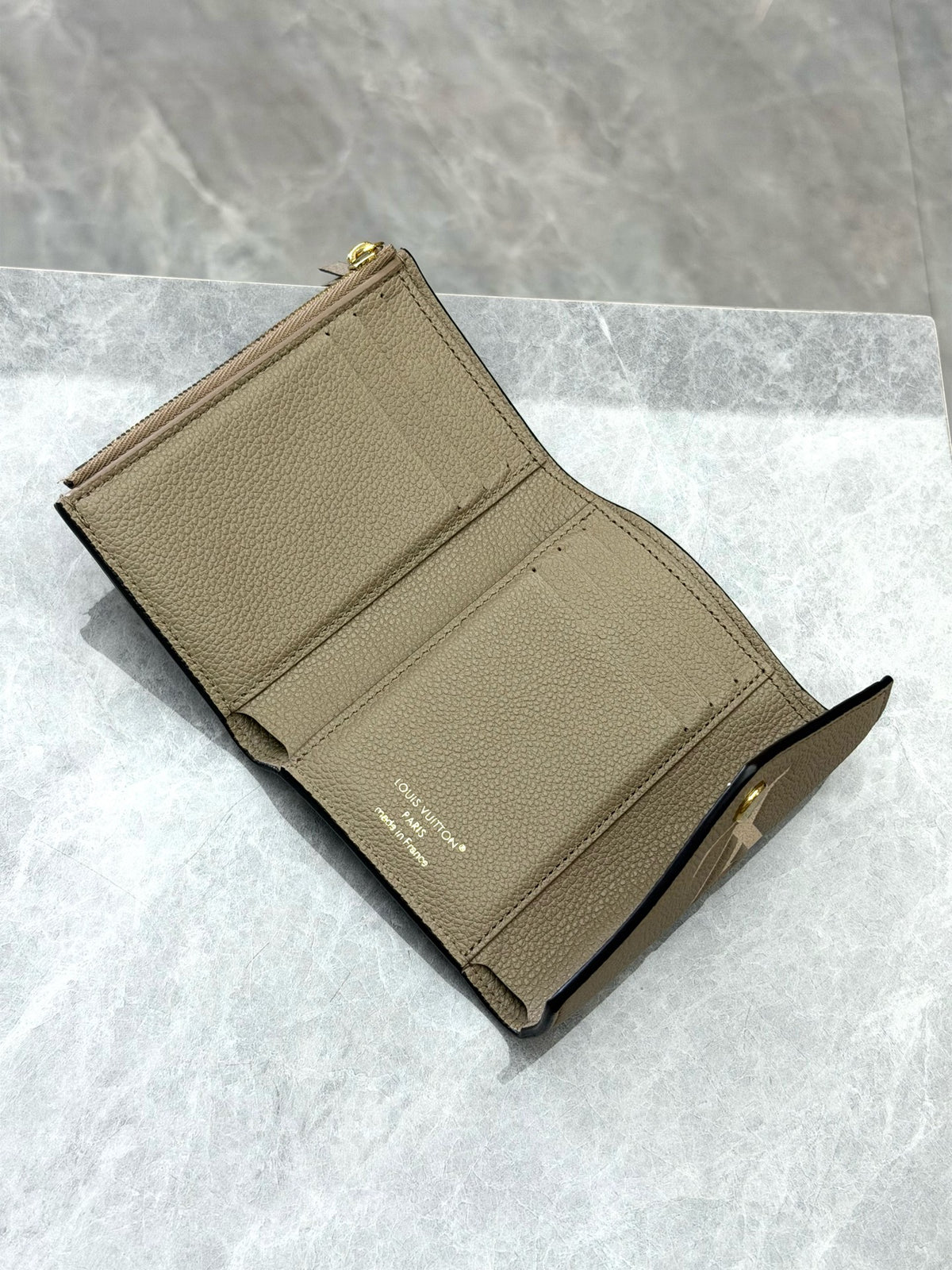 LOUIS VUITTON Victorine Trifold Wallet – Elephant Grey Monogram Empreinte with Gold-Tone Snap, Good Pre-Owned