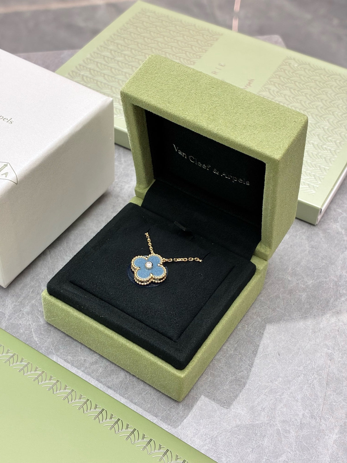 VAN CLEEF & ARPELS Holiday Limited Edition 2026 Alhambra Pendant – Blue-Grey Ceramic with Gold and Diamond Rim, Brand New