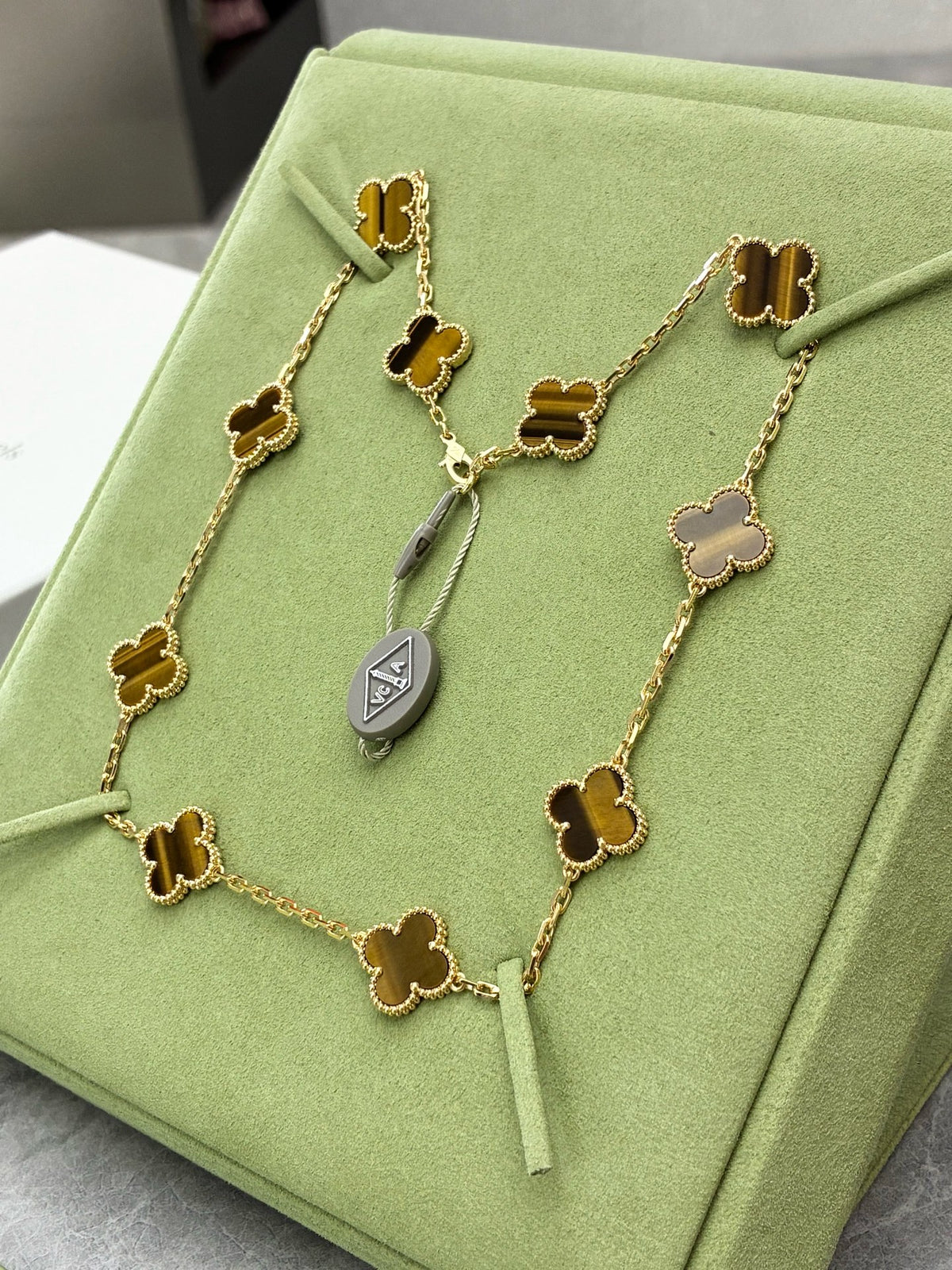 VAN CLEEF & ARPELS Vintage Alhambra Necklace – Ten Motifs in Tiger's Eye with Beaded Gold Rims, Brand New