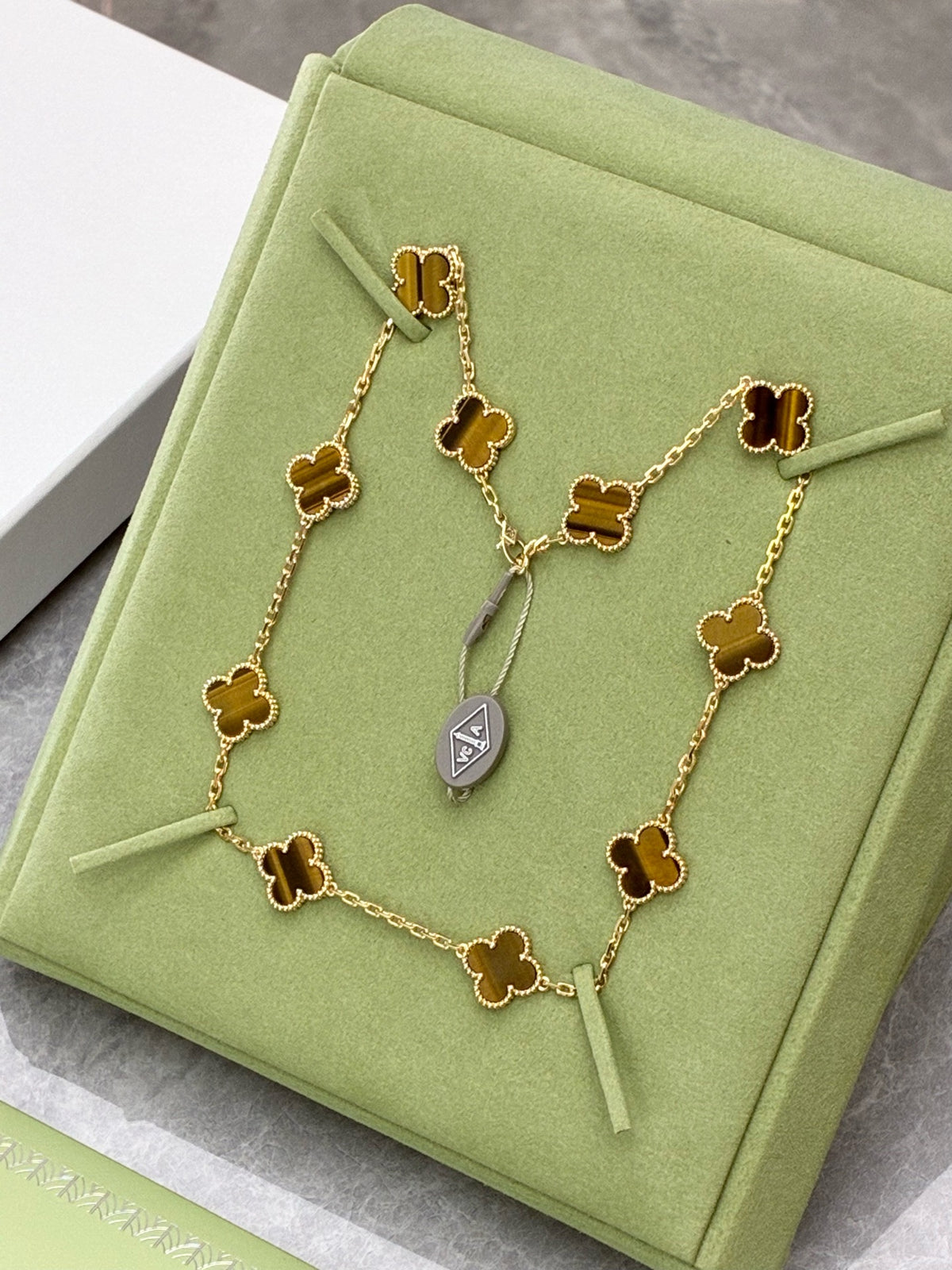 VAN CLEEF & ARPELS Vintage Alhambra Necklace – Ten Motifs in Tiger's Eye with Beaded Gold Rims, Brand New