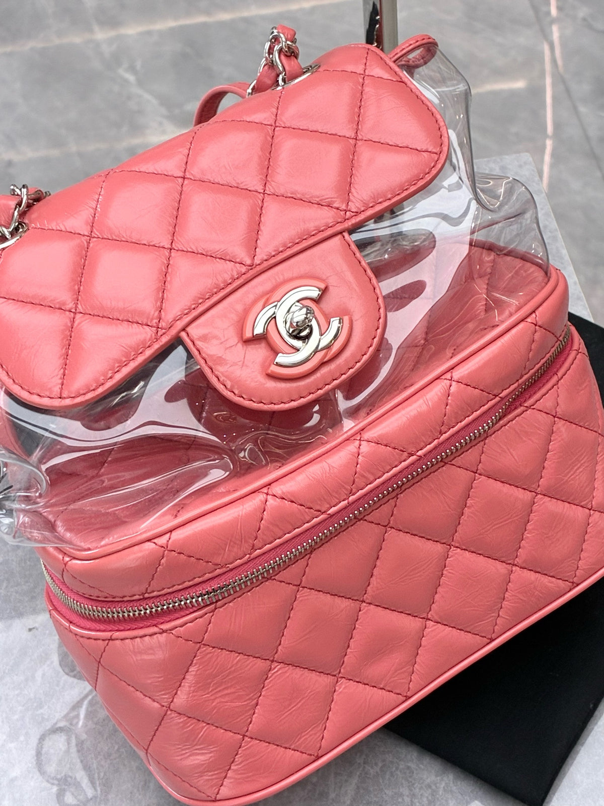 CHANEL 18S Backpack – Pink Lambskin and Clear PVC with Silver-Tone CC, 24 x 11 x 22 cm, Good Pre-Owned