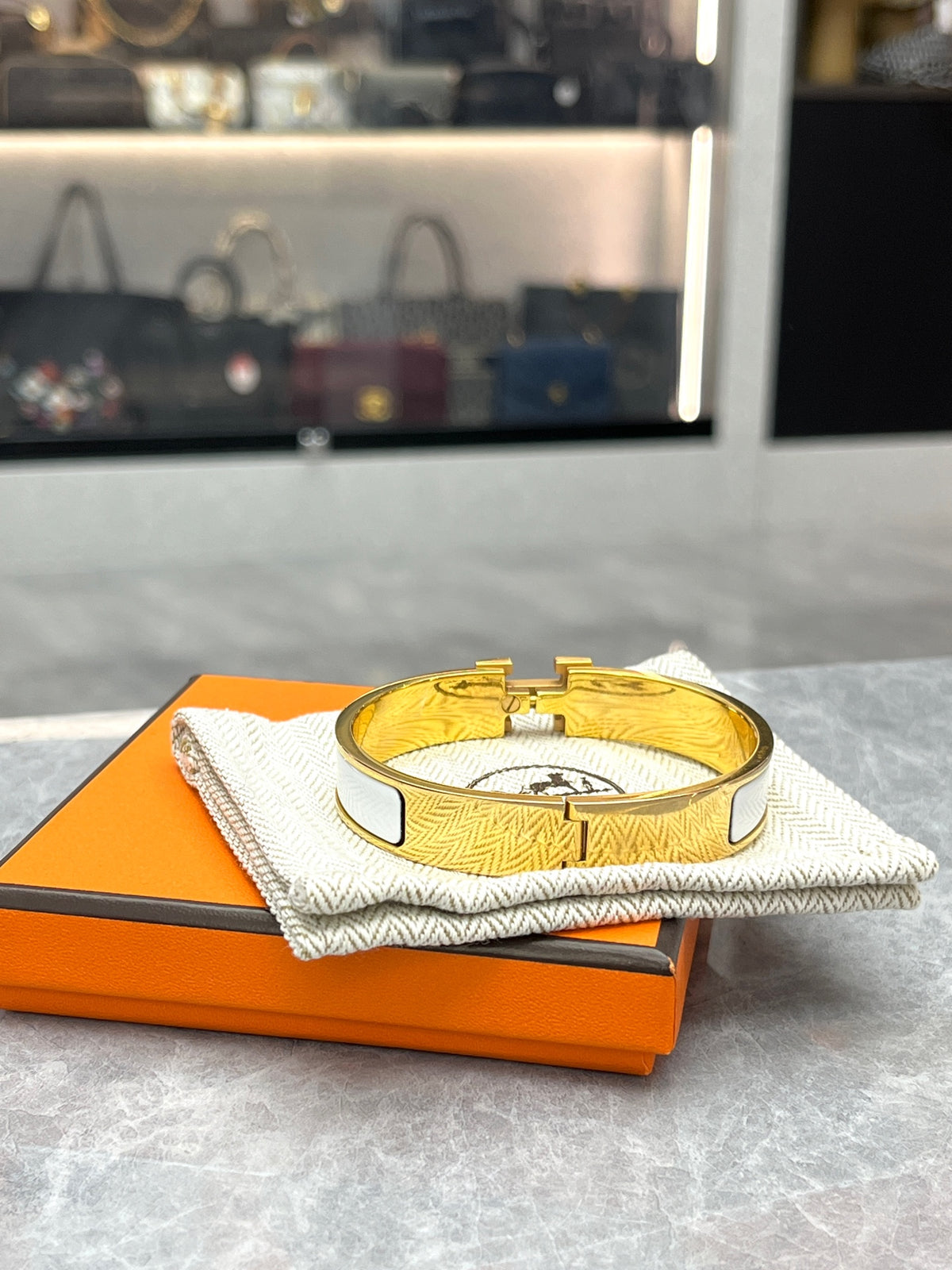 HERMÈS Clic H Bracelet – White Enamel with Gold-Tone H Clasp, Good Pre-Owned