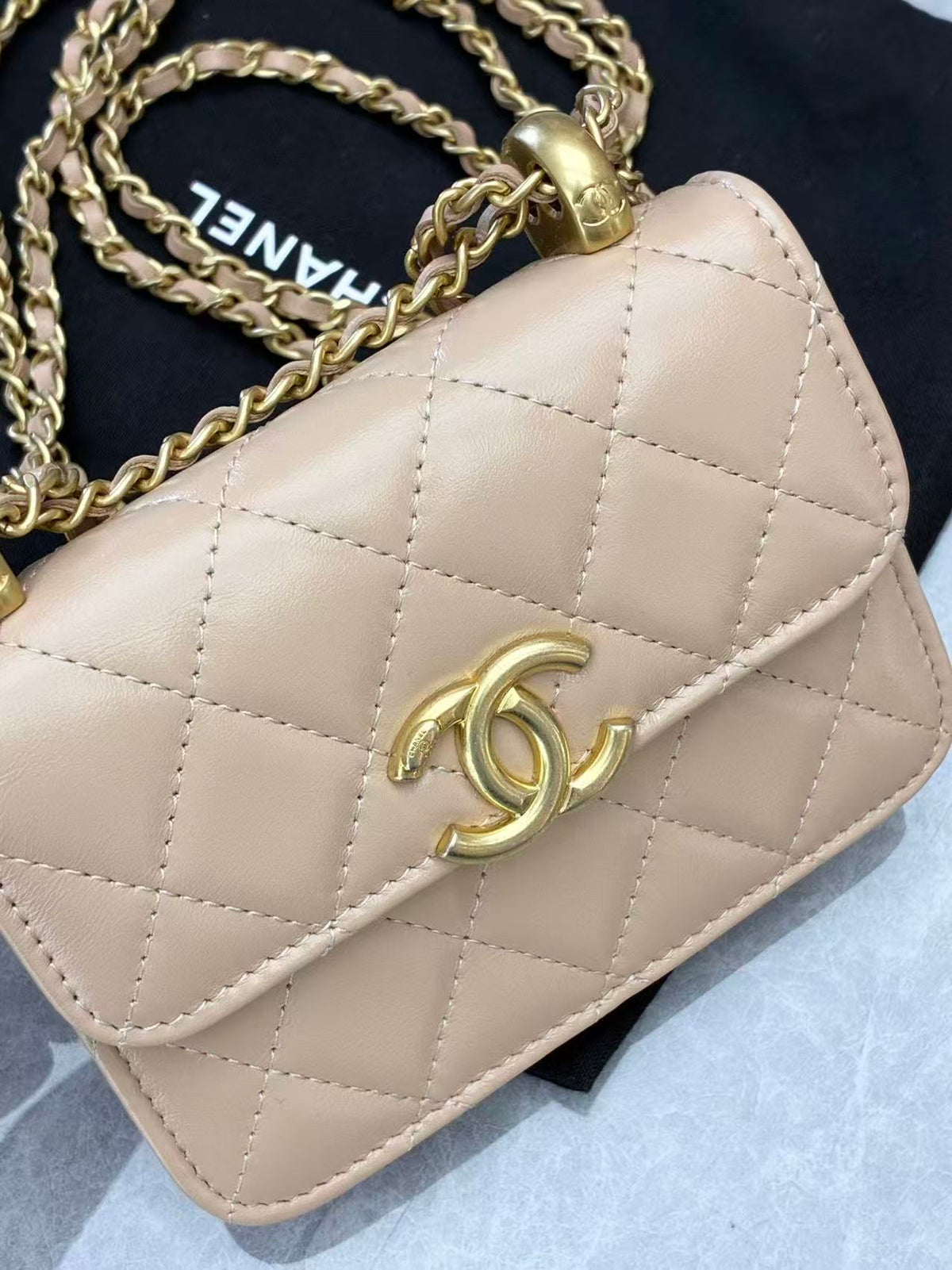 CHANEL 21A Wallet on Chain – Milk Tea Beige Quilted Lambskin with Gold Hardware and Double Gold Balls, 12.5 cm, 31 Series, Excellent Pre-Owned