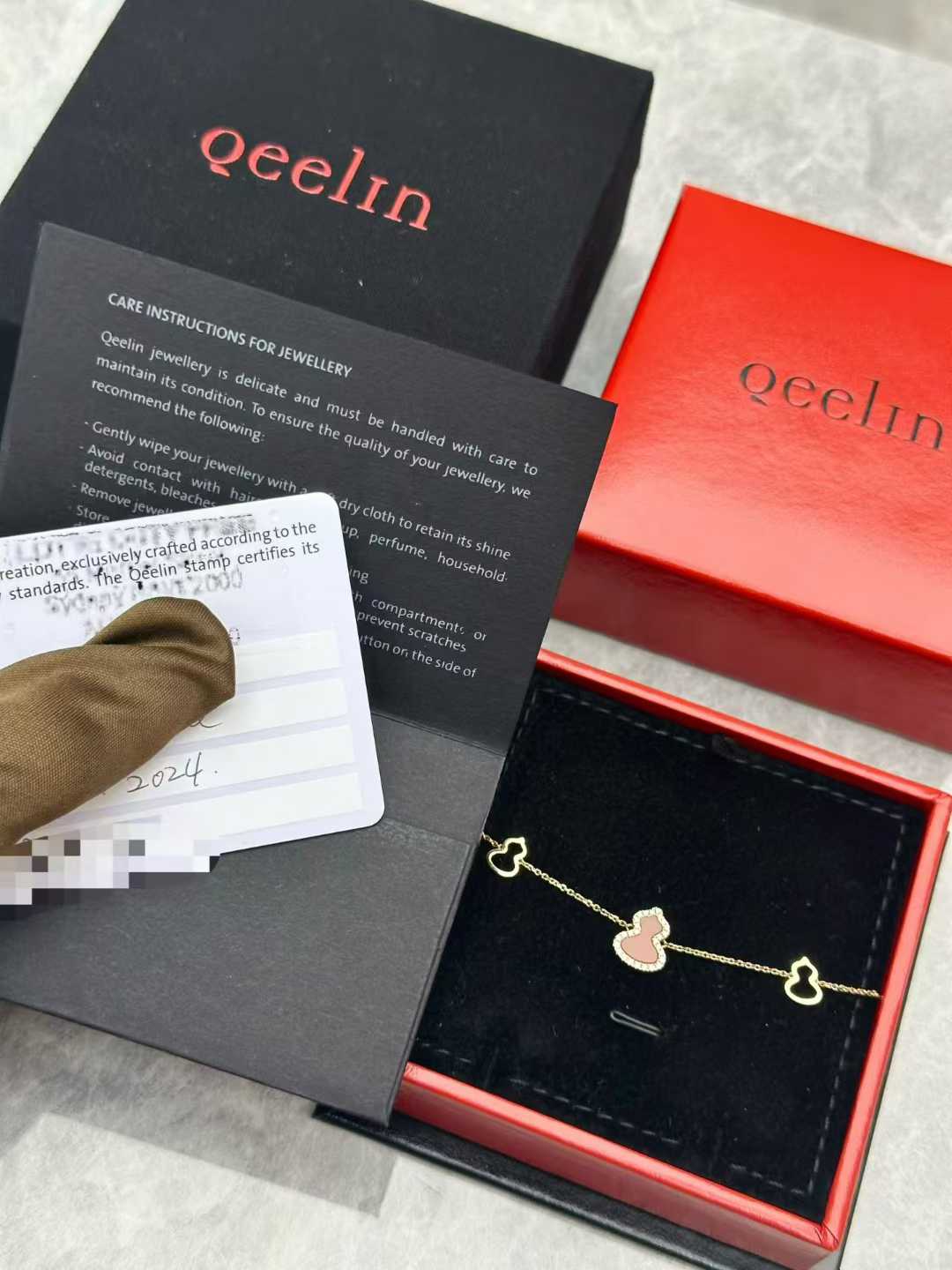 Qeelin Petite Wulu bracelet, 18K rose gold with diamonds and red agate