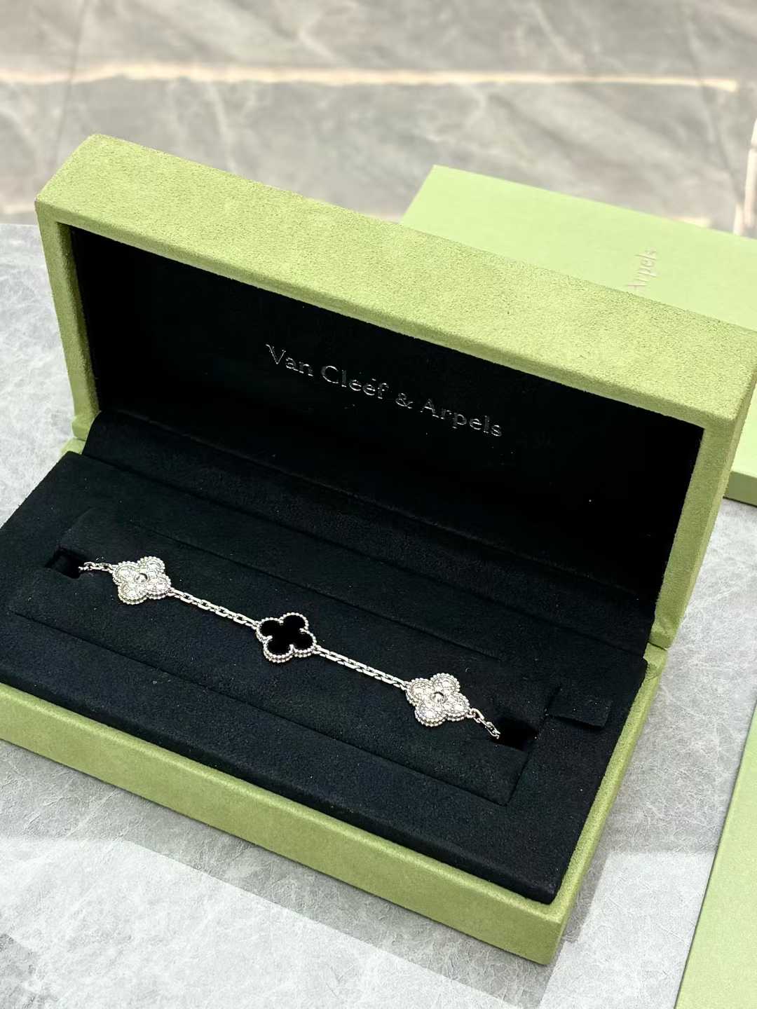 Van Cleef & Arpels Vintage Alhambra 5-motif bracelet in white gold with diamonds and black onyx