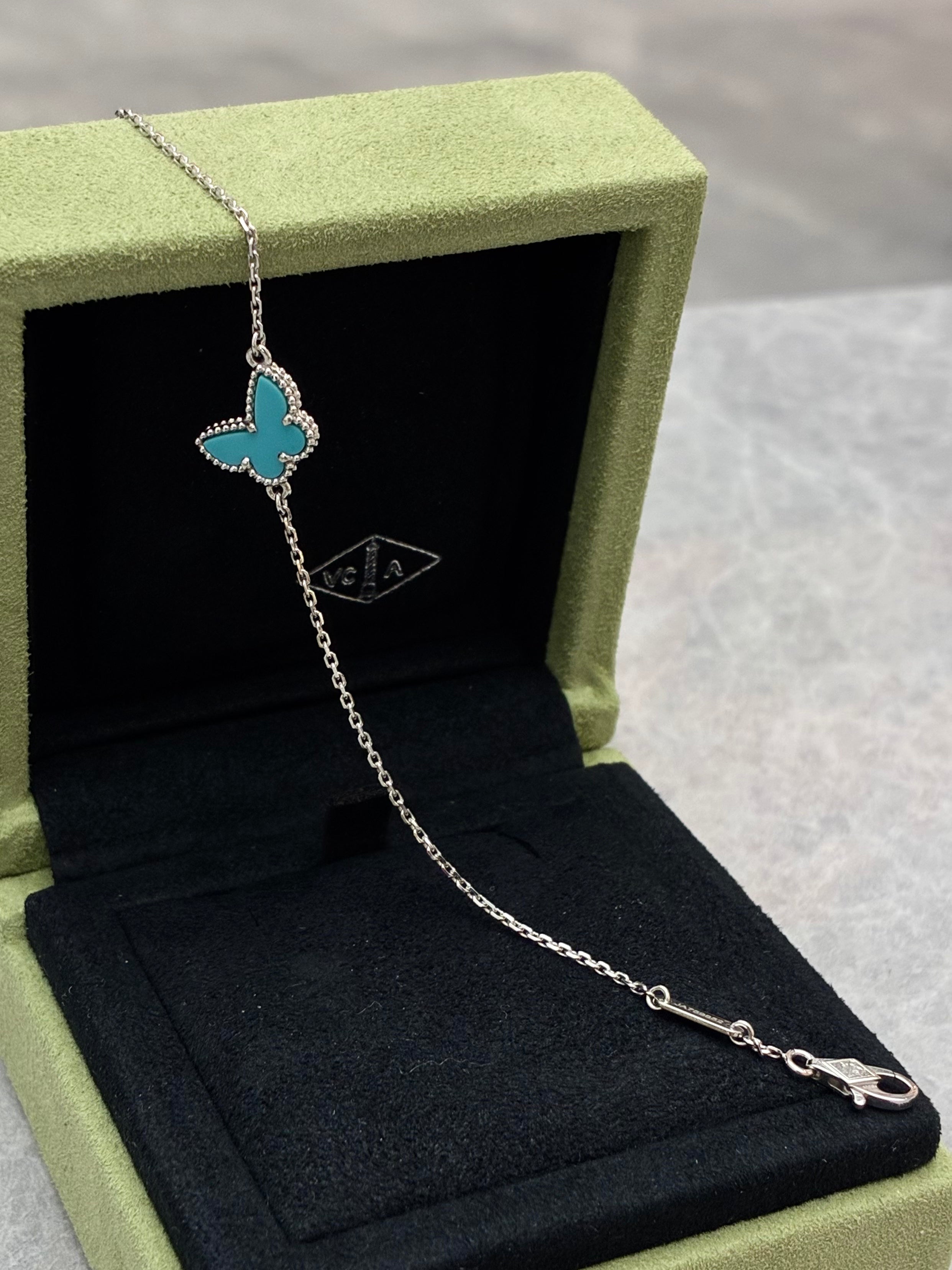 Van Cleef & Arpels Sweet Alhambra Butterfly Pendant in 18K white gold with turquoise