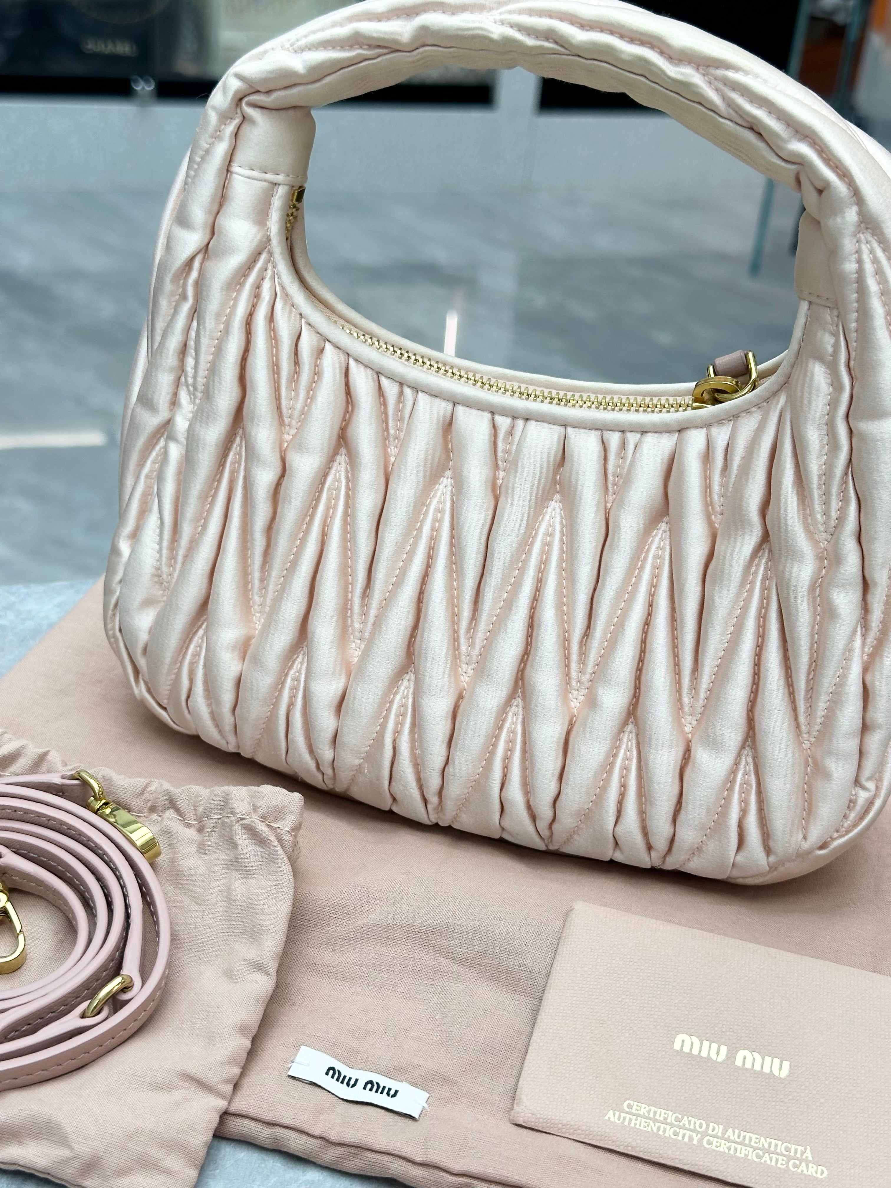 Miu Miu Wander matelassé satin mini-bag in alabaster pink