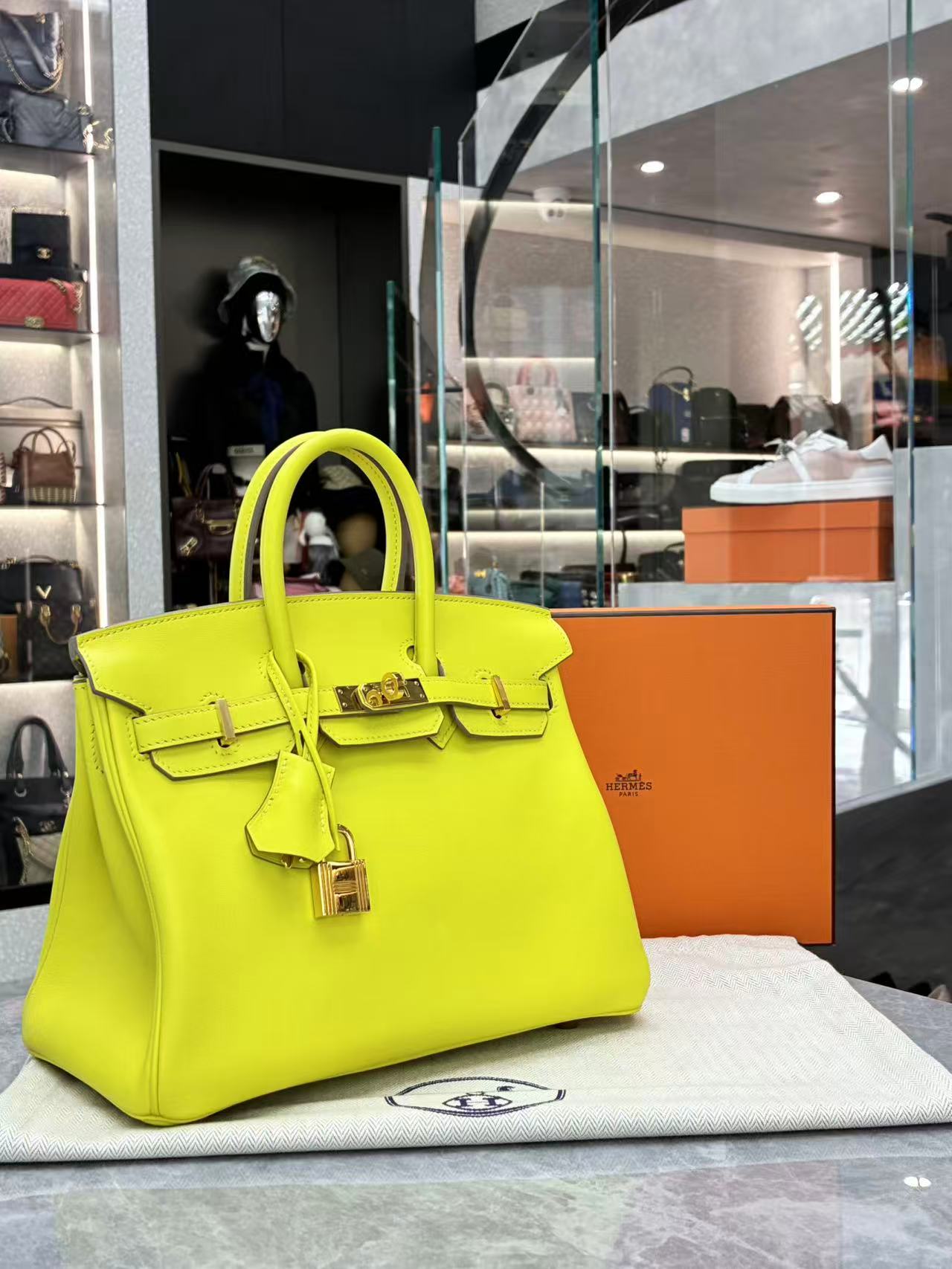 Hermès Birkin bag in the vibrant "Lime" color and Epsom leather with gold hardware