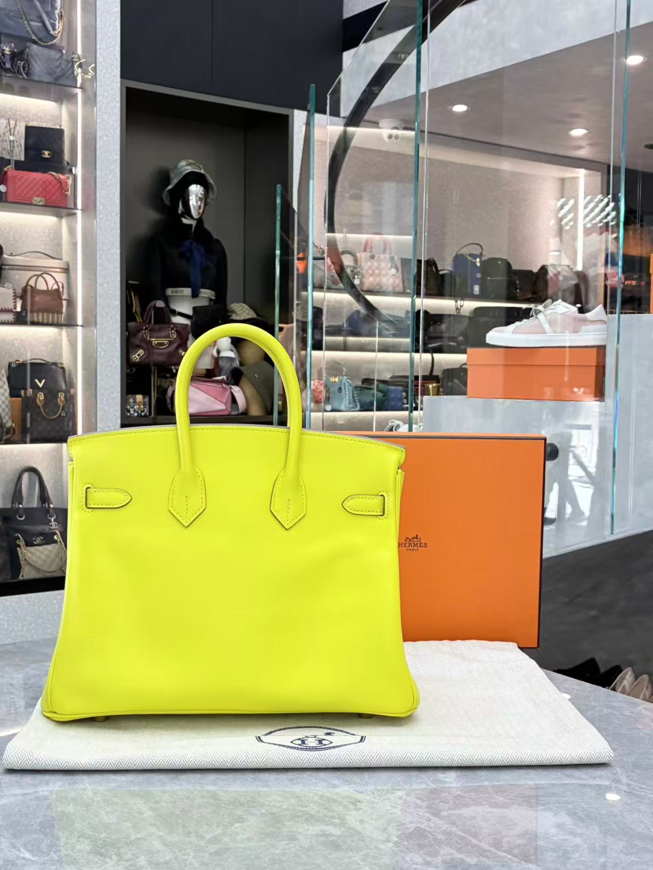 Hermès Birkin bag in the vibrant "Lime" color and Epsom leather with gold hardware