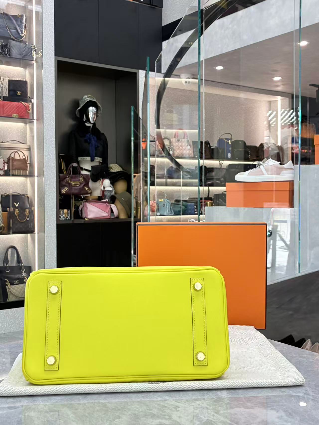 Hermès Birkin bag in the vibrant "Lime" color and Epsom leather with gold hardware