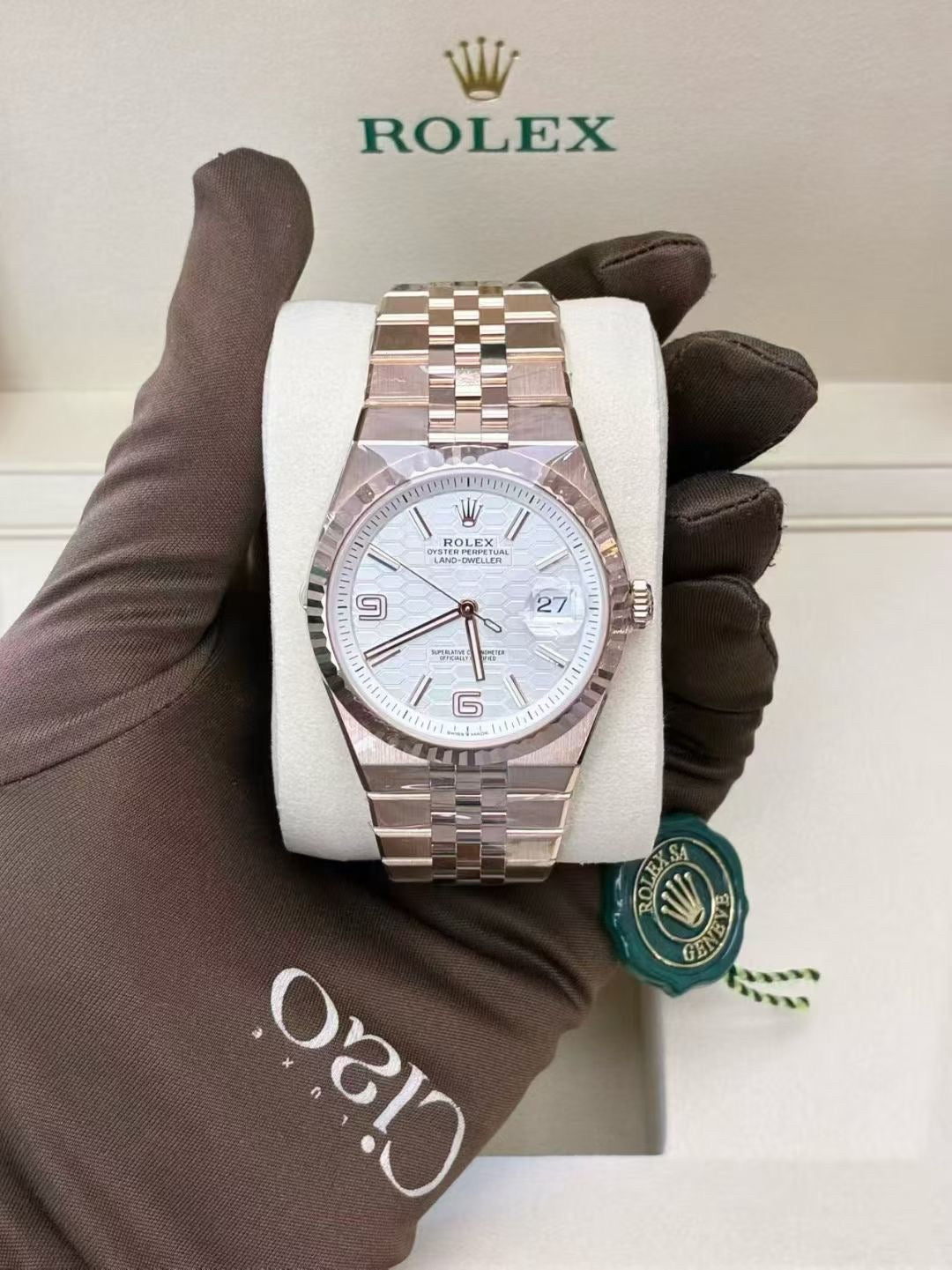 Rolex Land-Dweller in 18k rose gold with a white honeycomb dial