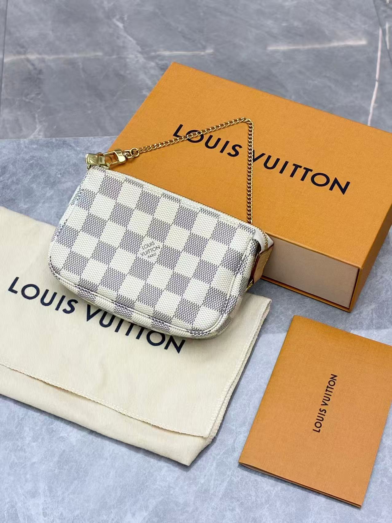 Louis Vuitton Mini Pochette Accessoires in Damier Azur canvas
