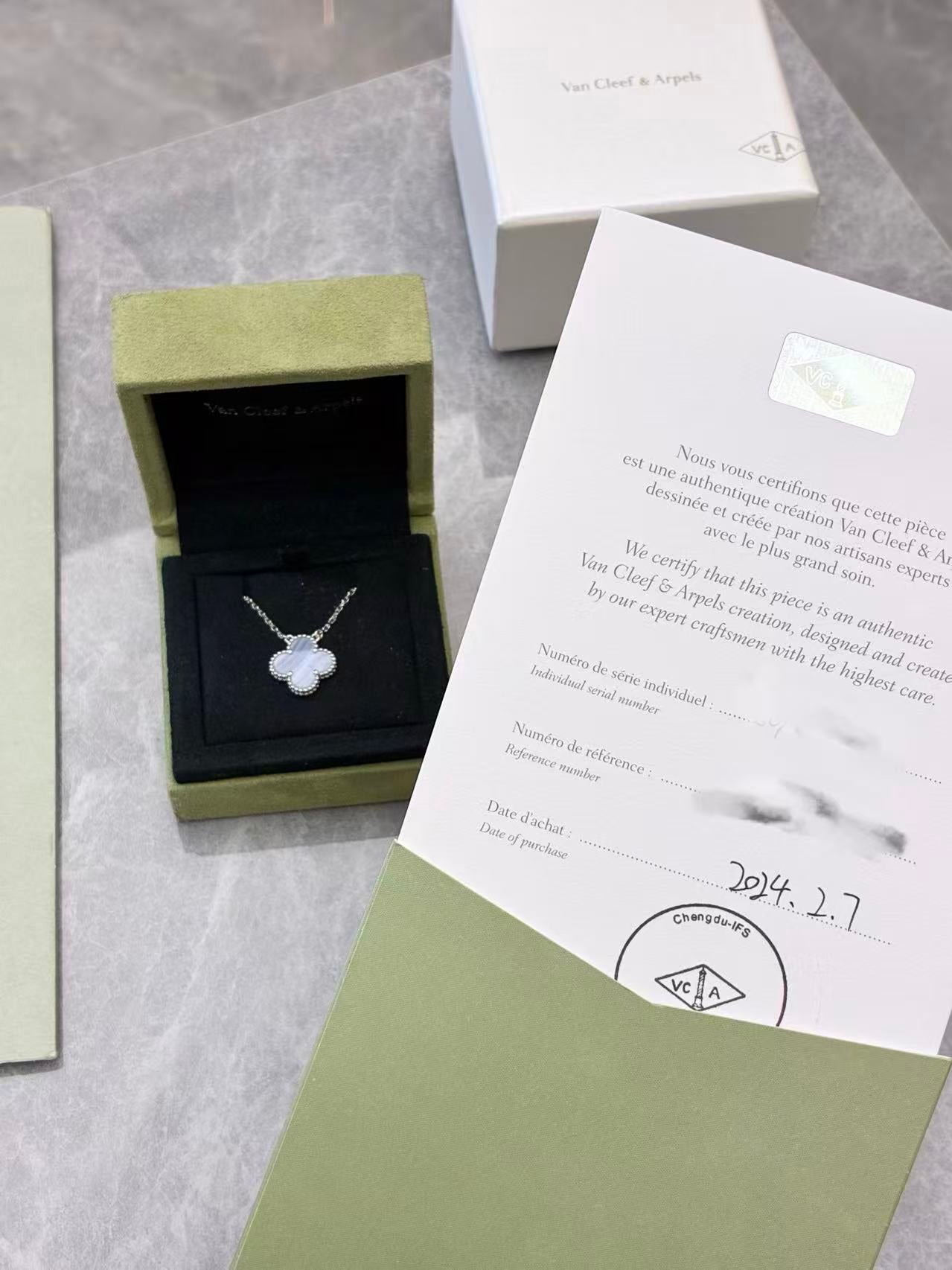 Van Cleef & Arpels Vintage Alhambra pendant necklace crafted in 18K white gold with chalcedony