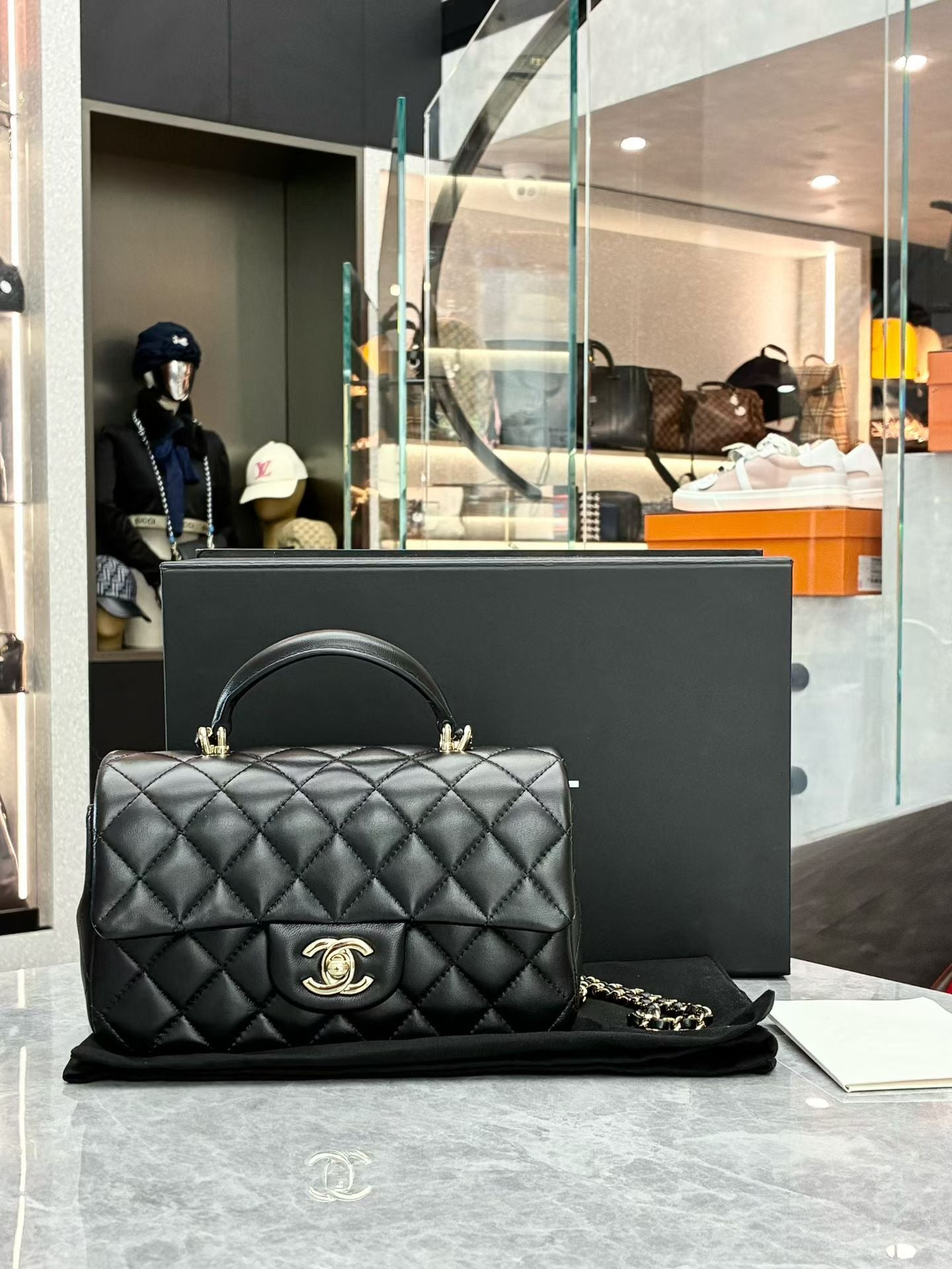 Chanel Lambskin Quilted Mini Top Handle Rectangular Flap bag in black