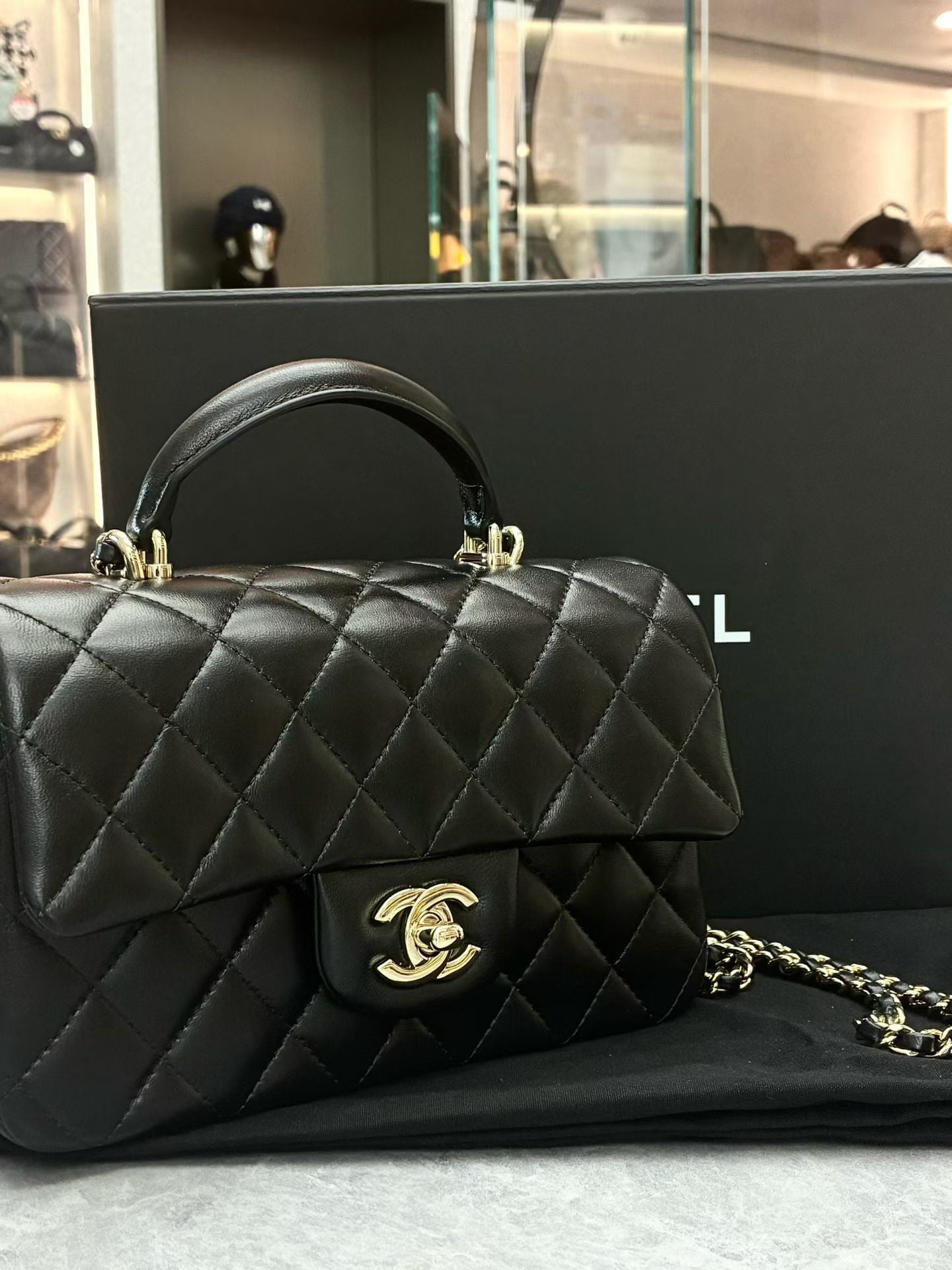 Chanel Lambskin Quilted Mini Top Handle Rectangular Flap bag in black