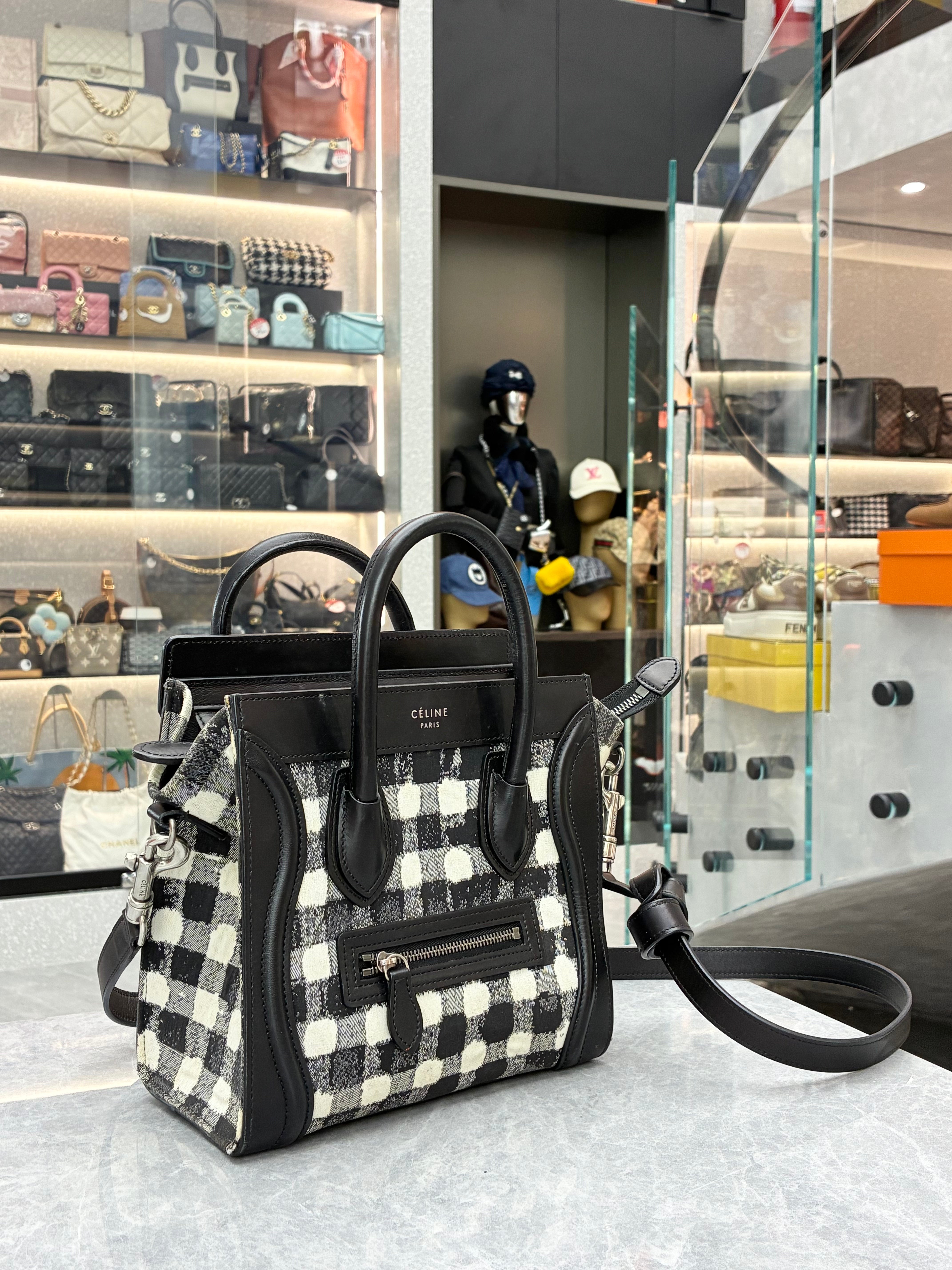 Celine Luggage Nano “Micro” bag in a distinctive black-and-white check pattern